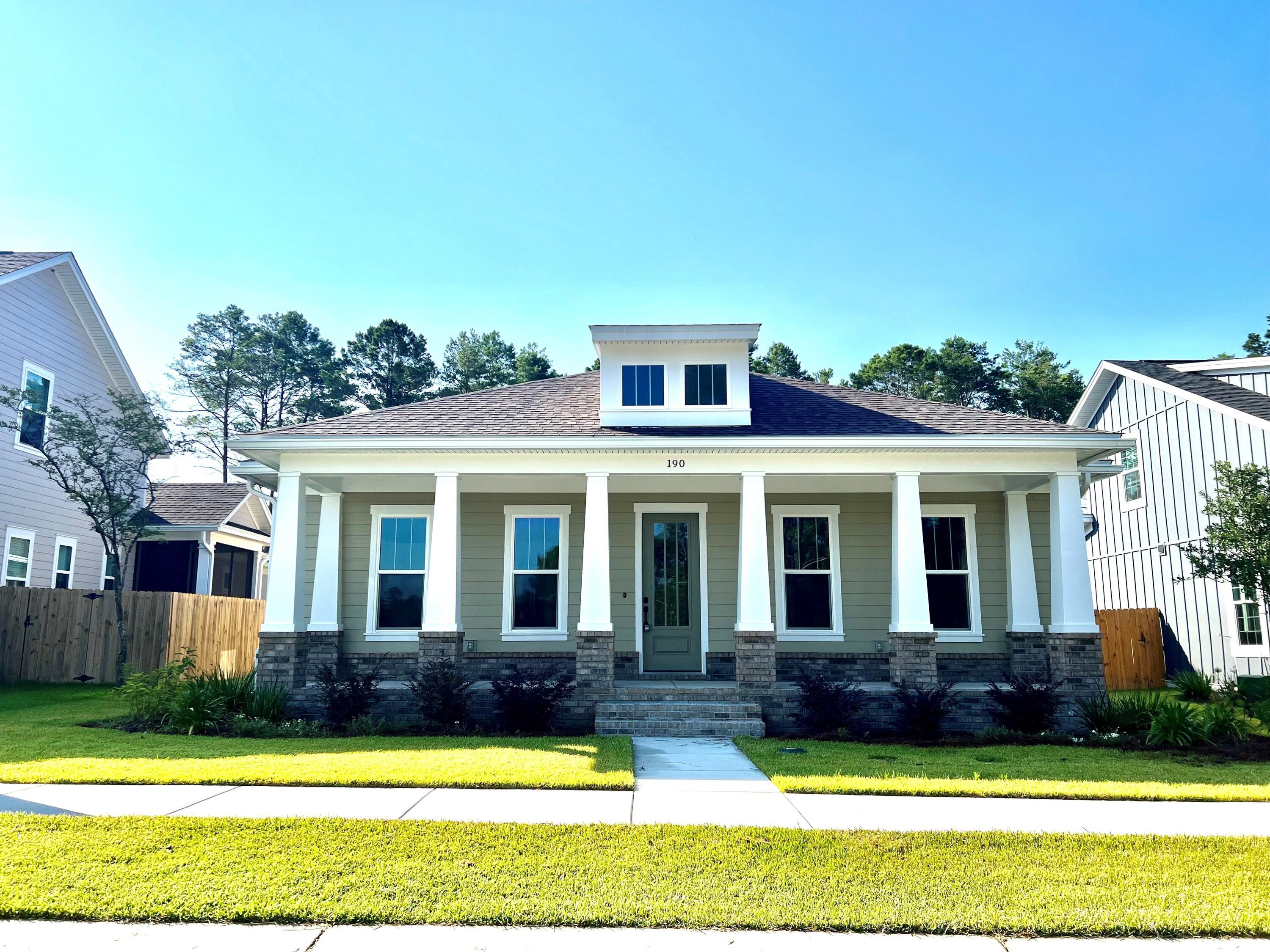 New, Charming Florida Cottage Home under construction in Niceville, FL largest new community, Deer Moss Creek. 1 story, 4 BR/2.5 BTH home w/ a large southern style front porch that spans the entire width of the front. Open concept floor plan in the kitchen, dining room and living room to gather w/ friends and family. Rear entry garage off a private, auxiliary road, and a nice porch and fenced in back yard. the 4th bedroom could also be an office . 10ft ceilings, beautiful, engineered hardwoods and shaker style cabinets w/ soft close drawers. Gas range and tankless, gas water heater. Estimate completion in June Pool, Clubhouse, 1/2 basket ball court and children's park, under construction. Natural walk.