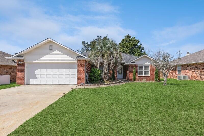 Deeded access to the Santa Rosa Sound! Super Low annual fees of $200. Energy efficient solar panels installed by homeowners on newer roof - saving hundreds of dollars in electric bills. As you step into this beautiful 3-bedroom, 2-bathroom home, you'll immediately notice the luxurious newer vinyl plank flooring which is present throughout the home. The welcoming foyer opens to the living area with cathedral ceiling and cozy fireplace and the bonus room that could be formal dining or office space. The kitchen is the real showstopper with stunning granite countertops, stainless steel appliances, a modern backsplash, a new sink and faucet, a central island, and newer cabinets! Roof is 3 years old. The bedrooms are a split-plan. The master bedroom is generously sized to accommodate larger furniture. The master bathroom has been updated with granite countertops, new sinks, and faucets. The closets, connected to the master bath have been customized for storage efficiency. On the other side of the home, there are two guest bedrooms and a shared full bathroom. The home has new hardware throughout. A slider from the living room takes you out to the open patio and fully-fenced backyard offering privacy and security. Sandy Beach Estates is a gem and it's location is great for many different reasons, including its proximity to Hurlburt Field, the Beach, Shopping and Dining. Don't miss out! his property has so much to offer! Assumable loan for solar is with Mosaic.