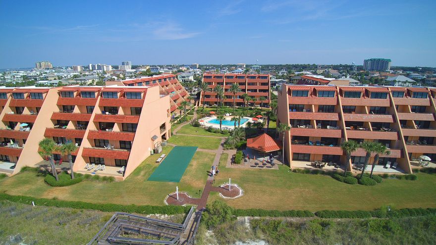 This 3 bedroom 3.5 bath Gulf Front Condo on Holiday Isle is move in ready! This unit offers breathtaking Gulf views from all three levels with a spacious balcony on the 1st and 2nd floor. The first level consists of the living, dining, kitchen and half bath. The second level has 2 bedrooms, 2 full baths and the laundry area, and the third level is a large bedroom with a full bath. Interior features include tiled floors in the entry, kitchen, baths and balconies. The two large balconies, one off the living area and one off the master bedroom both have great views of the Gulf of Mexico. This unit has never been rented, and is being sold completely furnished. Three bedroom units with this spectacular view are hard to find, and make for great rental income and a perfect beach getaway!