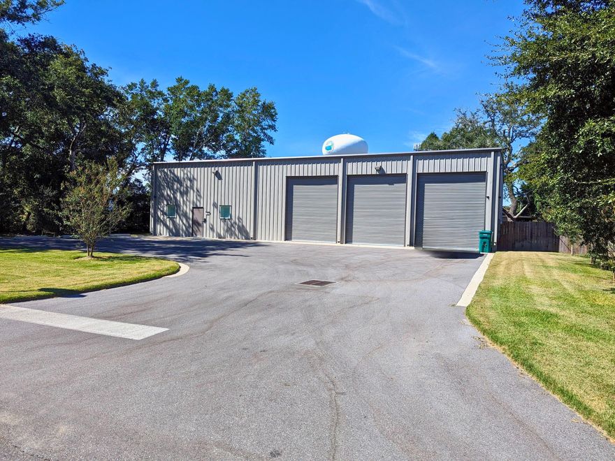 Industrial Warehouse plus office space. Warehouse has 4016 sq ft on the first floor plus 784 sq ft of office space and 784 sq ft of storage above the office space. Entire building is air conditioned. Paved parking in front of the building. 3 14ft rollup doors on the front and 1 14ft rollup door on the back. Back is completely fenced in. 1/2 acre lot leaves lot of room in the back for equipment or trailers. Built in 2021. Epoxy floors in the warehouse. 220 v, 30-amp and 50-amp power available. Security cameras inside and outside. A 40 x 8 storage container with electric is in the back and conveys. Office space consists of 3 offices, a break area and a restroom.