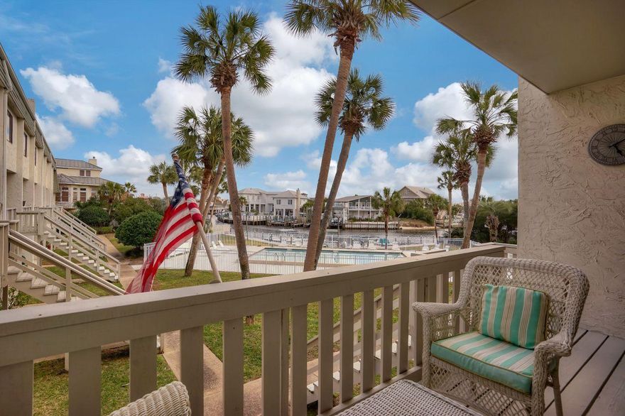 Isla Blanca is a low density townhome neighborhood that offers water access through the assocation owned boat slips. Just a few feet to the Gulf of Mexico along with beautifully landscaped courtyard and neighborhood pool, this townhome offers more than Gulf front condos ever could! Single car garage, private laundry room, two huge bedrooms each with their own private baths and updated kitchen and living area with views of the pool and canal. Kitchen updated in 2017 with white cabinets, granite counters and stainless steel appliances. Bathrooms in the bedrooms have new cabinets, sinks, fixtures and lighting. Current owners also have installed new flooring, paint, and blinds throughout the house. You cannot get such a fantastic permanent or second home so close to the beach with boat access