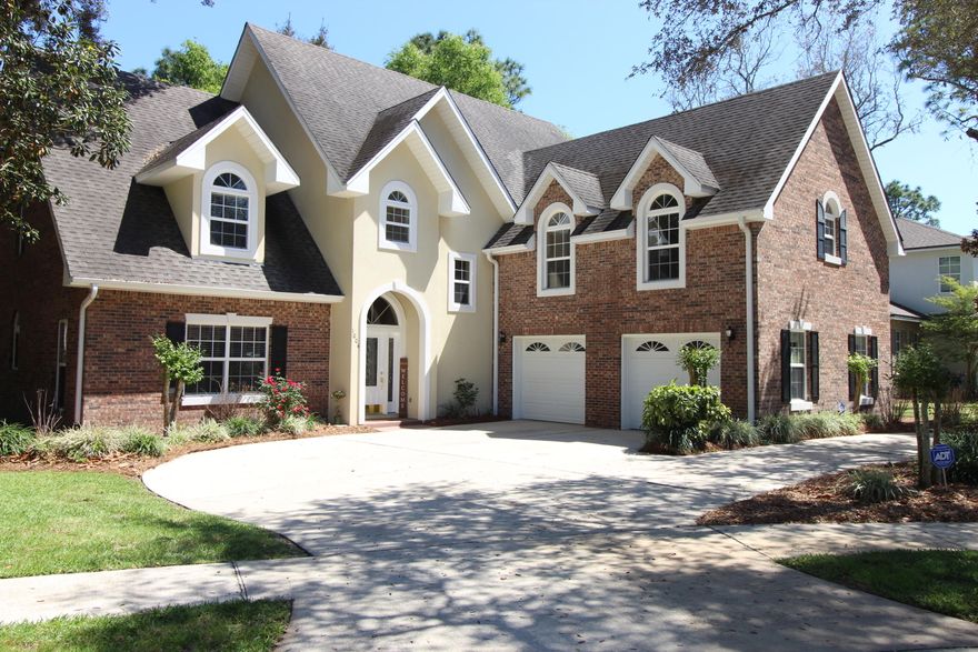 You will be amazed when you approach this beautiful one of a kind Swift Creek custom built home. Nestled on a quiet cul-da-sac and right next door to one of the many family parks in Swift Creek. As you step inside your first view will be the eight-foot windows with four-foot transom over each to bring in lots of natural light and the calming wave reflections from the inground salt-water pool. To your left is a flex room which could be used as the formal dining room or office. From the flex room or through the foyer and to your right is a dream kitchen boasting plenty of cabinets and granite counter tops. Center island with small chef sink and a high-top breakfast bar to the dining room. Built in oven and microwave along with a smooth-top drop in stovetop. Wood floors flow.... through the entire first floor. Through the dining room you will exit to the screen enclosed patio, pool, and hot tub out back. Just around the corner from the dining room you will be back in the family room featuring a custom corner gas fireplace with a built-in picture feature. Look up to the catwalk. Through the living room is a corridor leading to the hall bath, laundry room, garage entry and the Master suite. The Master suite is enhanced with lighted trey ceiling, French doors leading to patio, pool, and hot tub. The Master bathroom boast a whirlpool tub, separate shower, his and hers vanities, private water-closet, and the master's walk-in closet. Back through to the corridor and up the staircase leads you to a small loft and catwalk to the additional bedrooms and a grand bonus playroom above the garage. Two of the bedrooms connect at the jack and jill full bath with private water-closet and a tub/shower combo. At the end of the catwalk is a private guest bedroom with its own full bathroom. This house features a termite bond, heated pool, and hot tub. Exterior sprinkler system. The screen enclosure was replaced in 2019. New hot-tub heater installed Jan. 2021, Pool deck texture and painted in 2019 and a vacuum system to name a few highlights.  Come take a tour and experience for yourselves all this wonderful home has to offer. Swift Creek neighborhood features tennis courts, club house, pool, walking trails, area parks, gazeboes, playgrounds. A lake for fishing or enjoy a picnic watching the turtles and wildlife. Sidewalks are lighted by the many soft glowing streetlights.