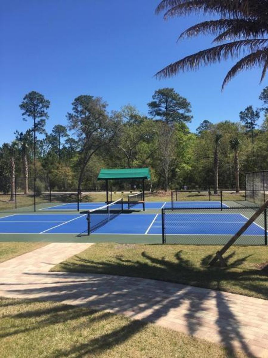 Fantastic opportunity to purchase in this exclusive gated community in Freeport.  Beautifully planned with an Old Florida Cottage vibe!   Bear Creek is close to the Bay and a short drive to the beach.  Amazing amenities including a tennis court, clubhouse, pickle ball court and community pool.
