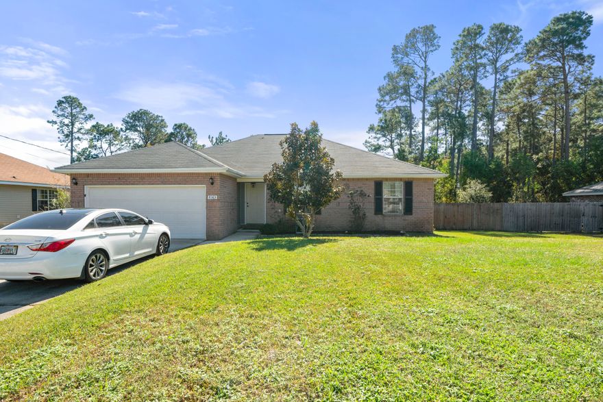 Welcome home! This home boasts cathedral ceilings in the Great Room and open lay out, allowing plenty of natural light to brighten up the home. The lot has been fully cleared allowing plenty of space for playground, RV/Boat parking, entertaining friends and family in the covered deck with cathedral ceilings. Additionally, this home is perfectly located in the heart of Navarre, only minutes from white sandy beaches, schools, shopping, dining, military bases and health care facilities. NO HOA fees.