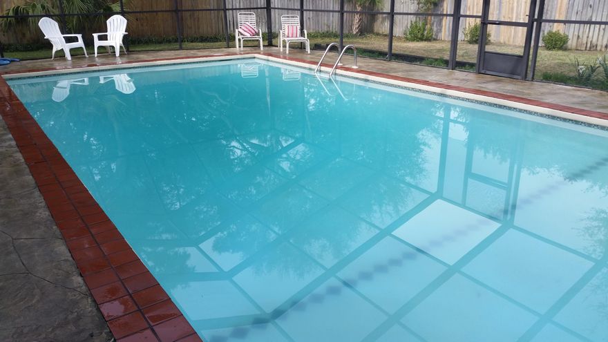 Looking for a pool home with very little work involved? This one is your answer. Fully screen enclosed so you don't have to worry about leaves and debris getting in the pool. An extra plus no mosquitos while you enjoy your pool. This home is a great location just across from waterfront homes and down the street from the boat launch. It was totally renovated in 2011 to include new carpet and tile, new siding and windows and exterior doors, new appliances, counters and cabinets. Landscaped with a new irrigation system and St Augustine sod. The home offers a living room on the front as well as a large family room across the back of the home. The current owners have taken excellent care of the home and it shows beautifully. Call for your appointment to see this one today.