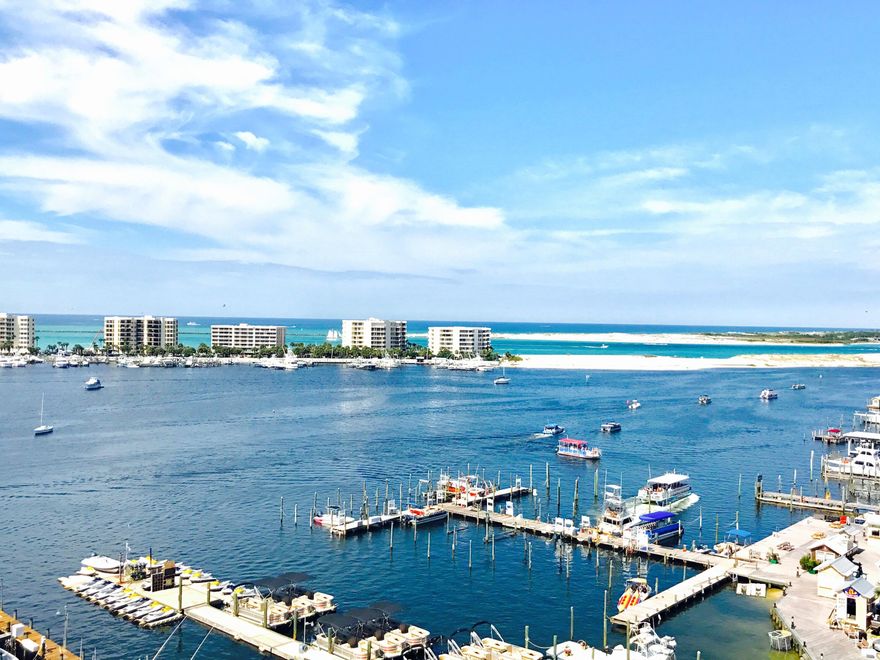 **$40,000 rebate for updates at closing with accepted offer.** Amazing views! You'll never tire of gazing at Destin Harbor, East Pass, the Gulf, Holiday Isle the white sand beaches, celebratory fireworks ... and much more. The ever-changing tableau of Destin Harbor and surroundings define the best of the Emerald Coast, and this condo is your window on it all. Elegant by design, this spacious condo is ready to entertain friends & family, or be your private perch above it all. Thoughtfully selected for its premier location, it was the first condo sold in Destin Yacht Club, and is being sold by its original owner. A boat slip, capable of handling a 75-foot yacht, is included in the purchase price.