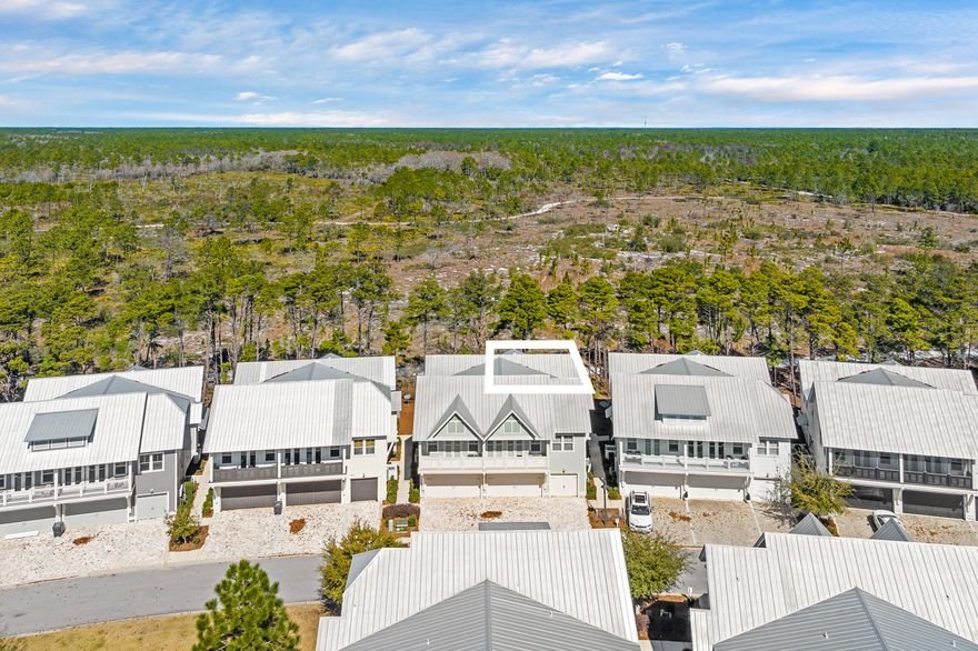 The sweet spot of 30A living starts right here in Prominence.What truly elevates this 'B' unit is the rare privacy off the back deck, backing directly to Deer Lake State Park. Instead of rooftops, you'll enjoy preserve views and peaceful natural surroundings--an unexpected and coveted feature along 30A. Offered fully furnished and rental-ready--with a golf cart included--this home is designed for both comfort and strong income potential. The first floor features a chef's kitchen, open dining and living space ideal for gathering, a powder bath, laundry, and a two-car garage. Upstairs, all bedrooms are thoughtfully positioned for privacy, including a light-filled primary suite with vaulted ceilings, dual vanities, and a glass-enclosed shower. Two additional guest rooms--one a bunk room--allow you to comfortably host family and friends while maximizing occupancy. 
Just steps from The Big Chill, minutes to Alys Beach and Rosemary Beach, and directly on the 30A bike trail, this location puts you in the center of everything that makes the area so special. Owners and guests enjoy two resort-style community pools and a private beach shuttle--making beach days effortless and car-free.

Turnkey, private, and perfectly located--this is 30A living done right.