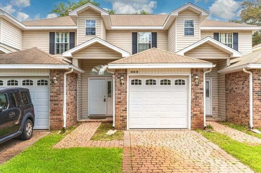 Ready for immediate move-in! Welcome to your new home in the heart of Fort Walton Beach! This spacious two-story two-bedroom, one-and-a-half-bathroom triplex unit offers the perfect blend of comfort and convenience.  The main floor includes a roomy living area perfect for relaxation and entertainment, a fully equipped kitchen with a breakfast bar, and convenience at its best with a half bath and spacious utility room. There are two comfortable bedrooms upstairs for peaceful nights. All of this and it has a one-car garage and backyard! The requirements are a credit score of 600 minimum, one year on the job or job offer letter showing a recent move, and a household income of $4125. Photos are of a similar unit with the same floor plan.