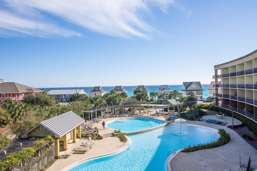 This condo is tiled throughout including the balcony. The bunkroom has beautifully built in bunks and TV area. Price includes furnishings.
This 4th floor unit has a great partial view of the gulf. Beach Resort is a family oriented community. The large zero entry pool and hot tub is a favorite of young families and couples. Beach Resort has deeded beach access through the Seashells by the Sea. Rental incomes are around $30K per year for this complex.