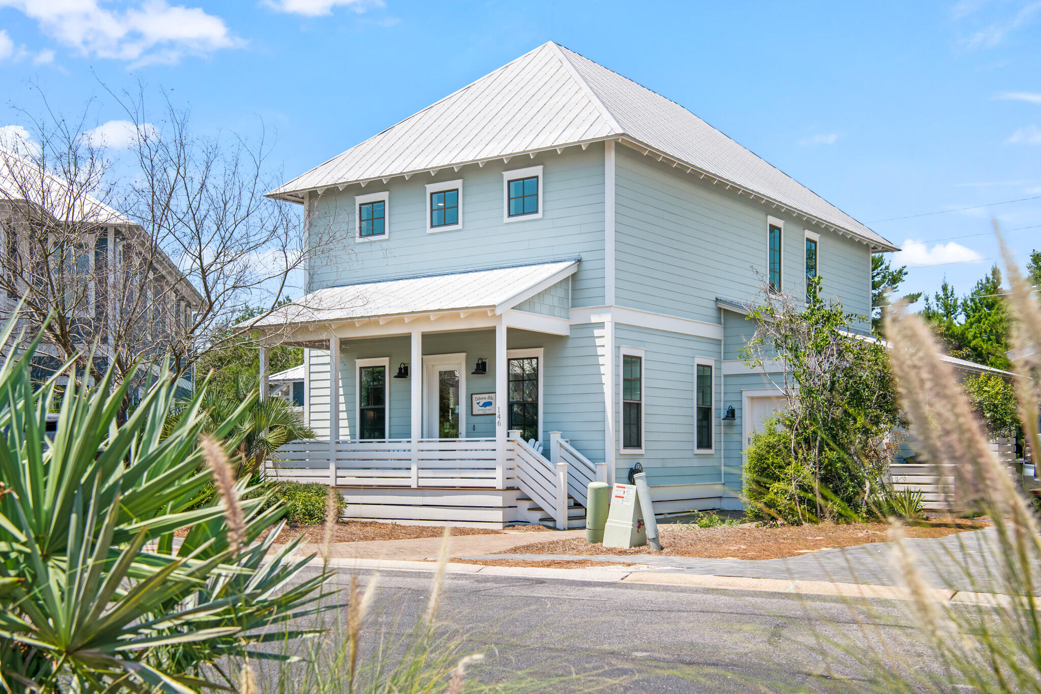 In one of the most desirable 30A communities, discover this beach cottage in Lakeside at Blue Mountain Beach. This home features a private gated path, allowing for a quick walk to the beach. In addition, this home contains a bright, open living area with impressive 21' architectural beam ceilings & a spacious kitchen. Outfitted with solid oak flooring, travertine, 8' doors & 10' ceilings, this home is perfect for family beach getaways, quick weekend trips or even take advantage of a rental income stream. Convenient beach access is accompanied by the State Forest's hiking & biking trails, Redfish Village's many dining & shopping options, not to mention neighborhood favorites like Blue Mabel Restaurant & Blue Mountain Creamery. Lakeside is a quiet neighborhood with a community pool and,