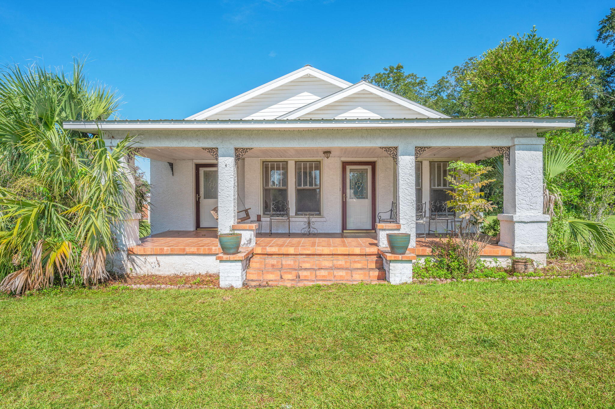 Located within the City of Florala this 3BR/1BA home offers over 1600 sqft with a remodeled kitchen that offers tons of cabinets, plenty of counter space and all the appliances! Home includes a large separate dining room as well as a large welcoming living room. Home has 3 great size bedrooms as well as remodeled full bath with a large tube and tile throughout. Home includes tons of storage with an inside utility as well as a great laundry room. The home includes an amazing welcoming front porch for afternoon sitting as well as a large covered back porch and patio! Property has an area for gardening, an 864 sqft detached workshop in the back yard offering you the ability to easily convert it into a mother-in-law suite or apartment. Home includes a great covered patio/carport, large yard and is centrally located in town. Low taxes, low insurance - makes this home a great buy! Convenient to Crestview and Eglin AFB!
