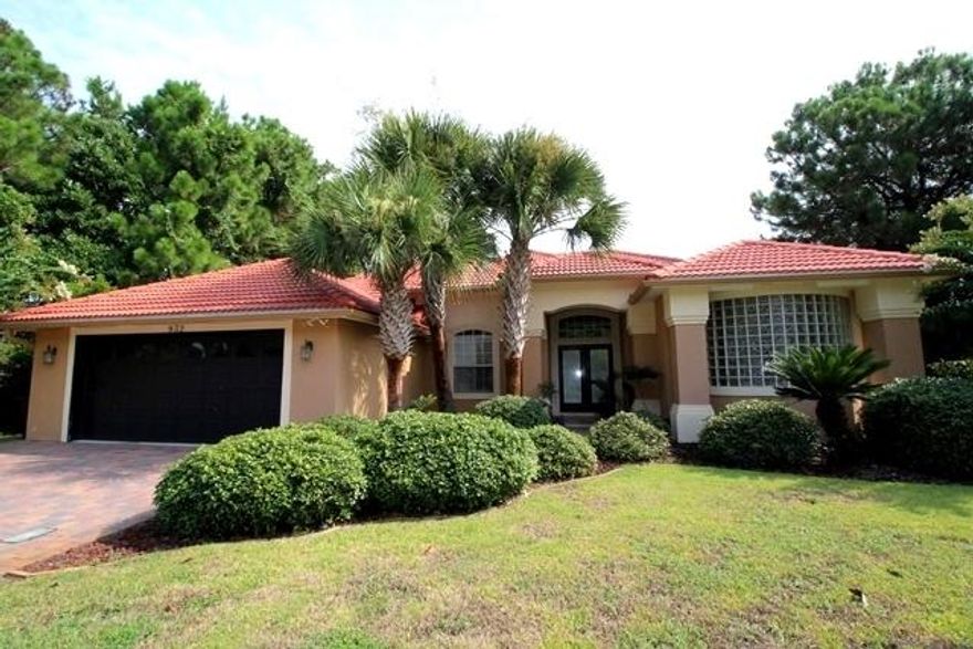 This exceptional 4 bedroom, 3 full bath home features a beautiful swimming pool, an open floor plan with 15 ft and 12 ft ceilings, travertine and hardwood floors, gourmet kitchen, granite counters, breakfast bar, new stainless appliances, trayed ceilings, and crown molding. The family room has a gas fireplace and incredible views of the golf course and pool. The master bath has dual walk-in-closets, separate vanities, oversized whirlpool tub, separate shower, and ample storage space. Exterior features include a concrete tile roof, lawn pump, sprinkler system and mature landscaping. This home is all-electric except for the fireplace, is wired for security, has an oversized 2 car garage with pull-down stairs and floored attic space. This fantastic property backs up to 10th hole.