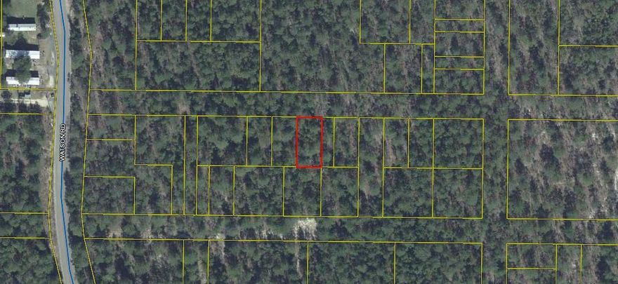 Wooded double-lot. This lot would need to be cleared and possibly cleared access. Mobile homes are allowed in this area. Buyer to verify all measurements.