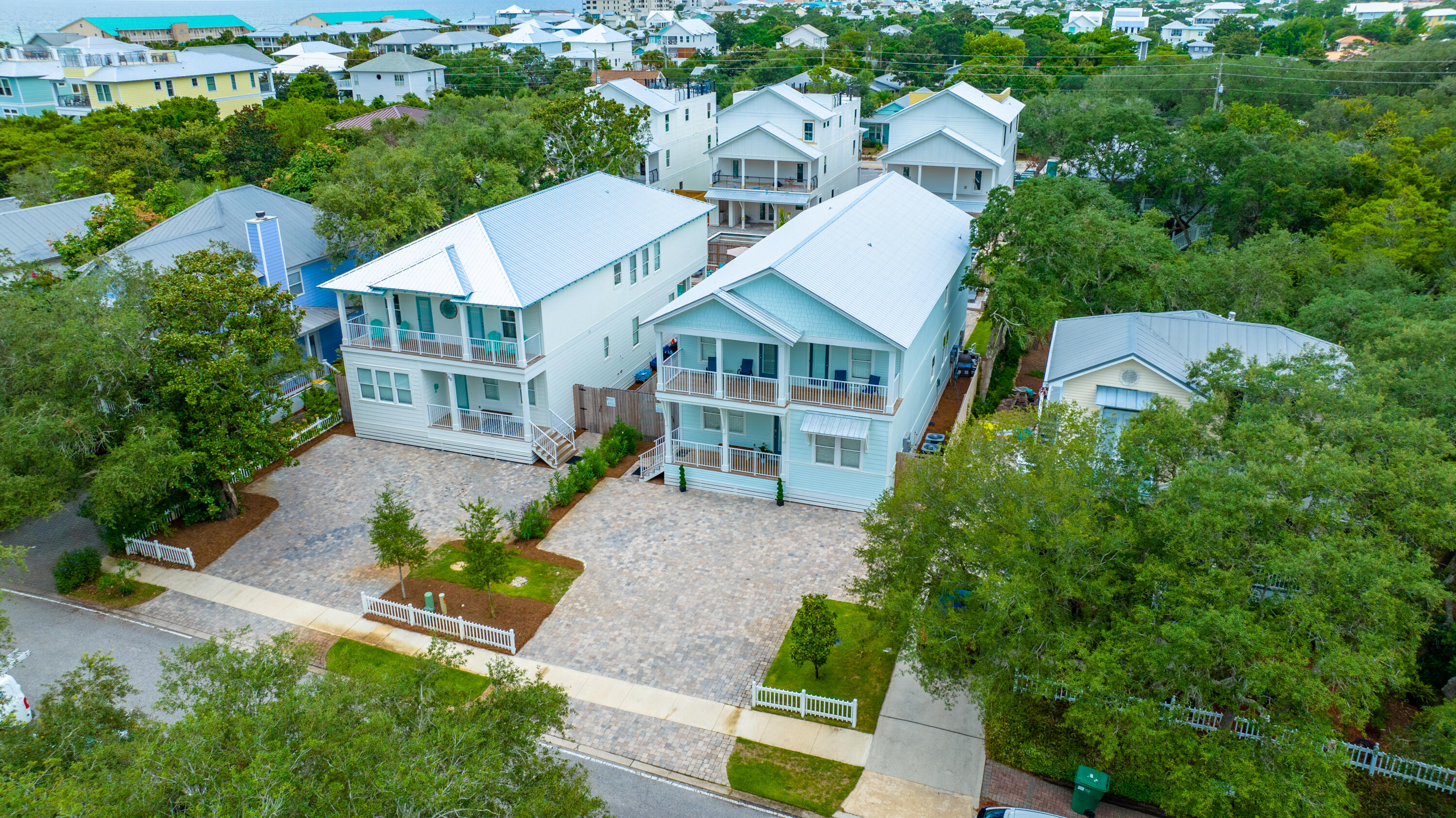 Nestled in the heart of Crystal Beach in one of the best neighborhoods on the Emerald Coast, this fully furnished turnkey rental property takes full advantage of Destin's unmatched vacation rental market! 2022 gross rental revenue as of 7/25 is $308k with a projected full year of $340k. Less than 2 years old, this beach vacation home was designed with modern amenities and comfortable details, including a breezy and open living/great room/kitchen with an oversized island, stainless steel appliances and quartz countertops. The great room features a built-in bar with a custom wine fridge and high efficiency ice maker, complete with a harvest table for casual group dining. The 10 ft shiplap ceilings create the perfect airy oasis ideal for gathering at the end of a long sunny day at the beach.