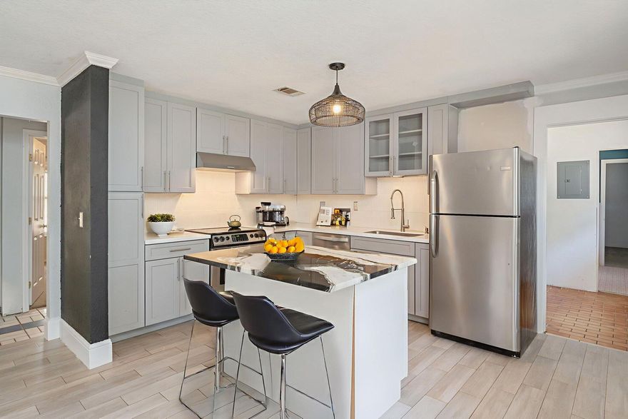 Discover a property where nature meets opportunity. Situated on a lush, one-acre lot shaded by a majestic canopy of oak, cedar, and sycamore trees, this home offers a peaceful, country-like atmosphere that is becoming increasingly rare. The grounds are a haven for the sustainable enthusiast, featuring a private backyard with a shed and a thoughtfully designed organic garden--complete with a custom herb spiral. Inside, the home serves as a versatile canvas for your vision. The expansive open floor plan is anchored by flexible "extra" spaces that allow you to design a layout that truly fits your life. While currently configured as a 3-bedroom residence, the floor plan allows for a seamless conversion into a 4-bedroom home or a dedicated creative studio. Whether you are looking to cultivate the land or customize your ideal living space, this unique gem offers the freedom to grow.