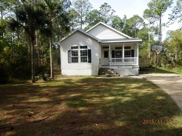 REO ~ Awesome Opportunity in the Heart of Santa Rosa Beach... This 3 Bd / 2 Ba Florida Cottage offers an open floor plan, new tile in the kitchen as well as new appliances. Off the dining is a brand new deck. With a little more TLC this will make an awesome starter home or rental investment opportunity.
