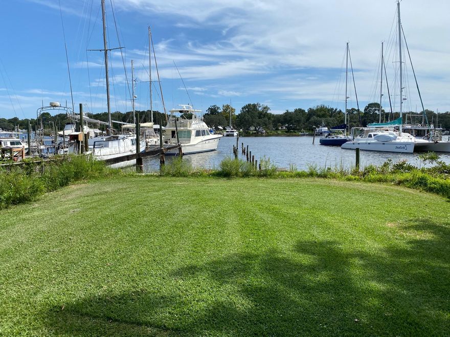 80' of waterfront ready for a deep water dock!  Lot next door at 305 Edgewater is also FOR SALE by the same owner!  Choose to do a full restoration of the home or tear down and build your dream waterfront home!  Seller has put a lot of sweat equity into cleaning the property. Buyer agent to verify all measurements.