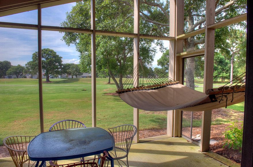 Have you been wanting a beach place for your family that wasn't so expensive that you couldn't afford it? This 2 bedroom 2 bath is perfect. Great price,upgraded kitchen and baths,a carport to keep your golf cart and a screened porch with a hammock no less. Life is good! You can even rent it if you would like. Your home owners Association pays your insurance, landscaping,pest control and takes care of the outside of the home including the roof. The master association provides 24/7 security, upkeep of all the common areas and pools, garbage pick up and cable TV. All you have to do is come and relax in your hammock! Available to show anytime.