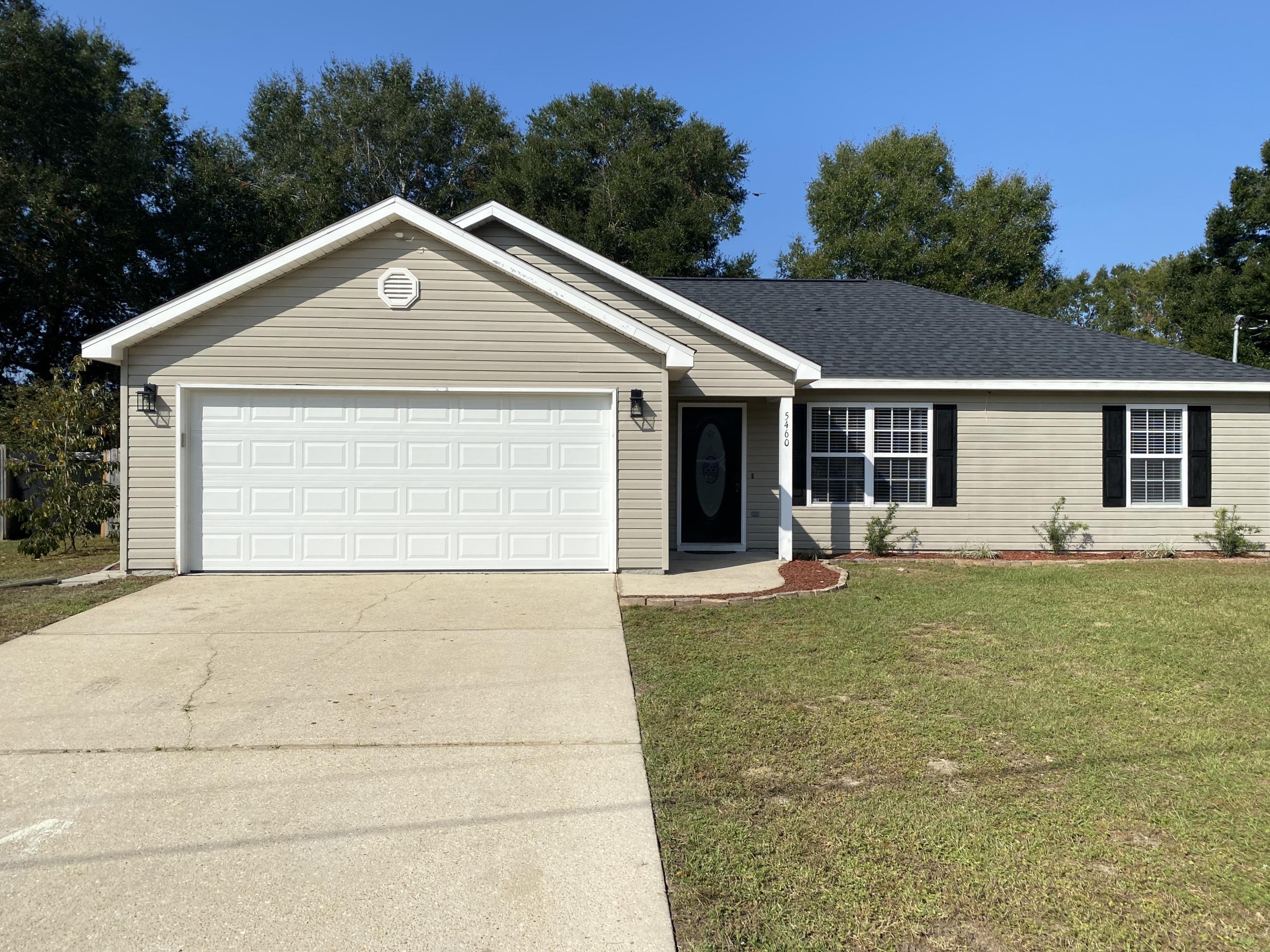 You will love this home! Built in 2002 but remodeled with todays trends! This gorgeous split bedroom design home has 3 bedrooms 2 baths. You will find rough cut shiplap walls in the vaulted ceiling living room, both baths, and master bedroom wall. Baths both have granite tops, new cabinets, and new fixtures. The upgraded kitchen has white cabinets, granite, new stainless steel appliances (including Fridge), and tiled backsplash. Throughout this home you will also find new upgraded craftsman trim around all windows, doors, and 1x6 baseboards. To maximize space, barn doors adorn laundry room door and master closet. The new dimensional shingle roof rounds out this trendy property. An absolute must see!