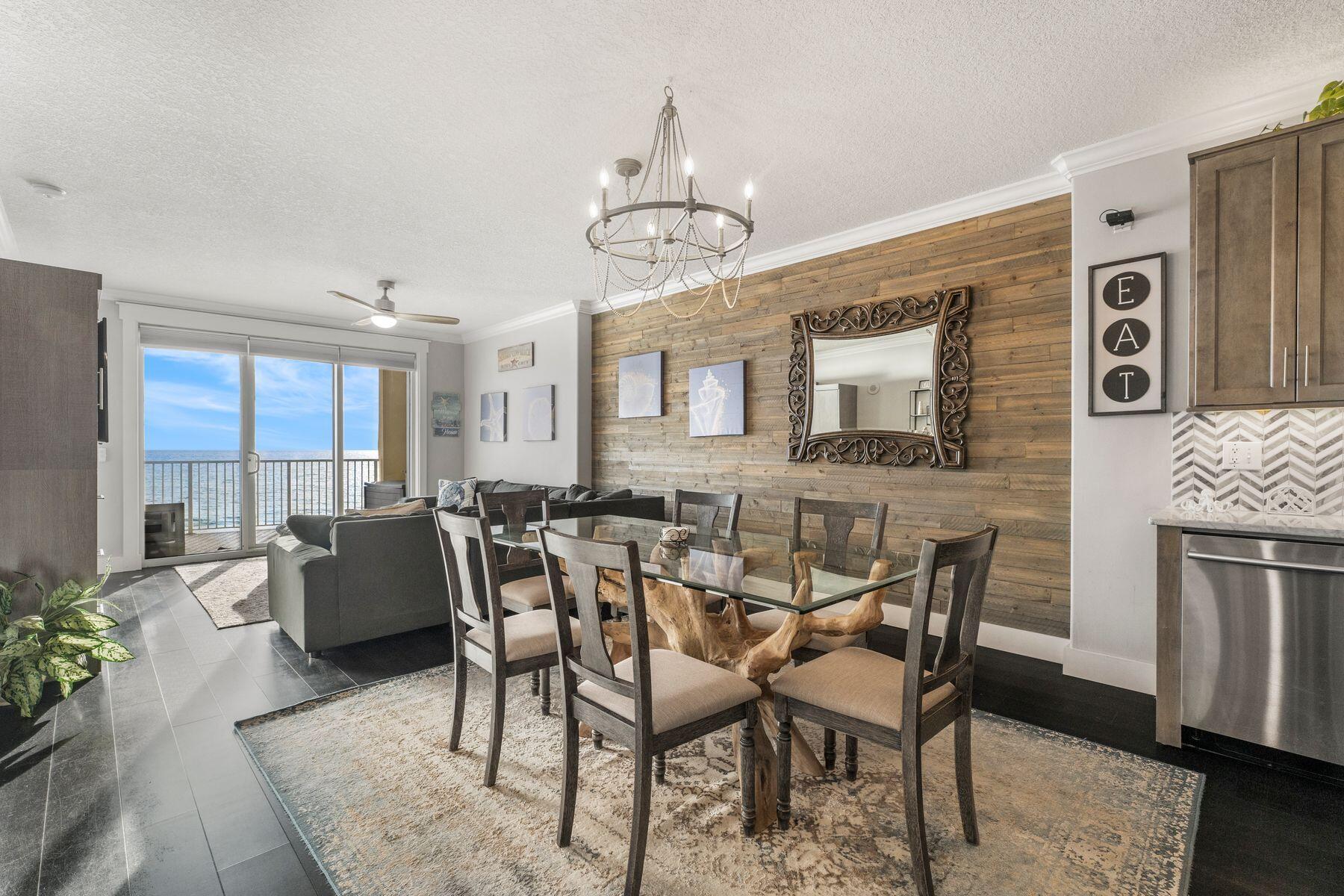Experience refined coastal living in this beautifully appointed beachfront residence at Emerald Isle Resort, ideally located on the desirable west end of Panama City Beach. Just minutes from the premier shops and restaurants of Pier Park and a short drive to the scenic beauty of Highway 30A, this two-bedroom, two-bath condominium offers an elevated lifestyle defined by panoramic Gulf views and effortless elegance. An expansive, oversized balcony extends the living space outdoors, creating the perfect setting to enjoy spectacular sunsets over the emerald waters.Inside, the residence is fully turnkey and thoughtfully designed with upscale finishes throughout. The custom kitchen features marble countertops, a center island, and a sleek induction cooktop, while solid interior doors and a tankless water heater speak to the home's attention to quality and detail. The Gulf-front primary suite opens directly to the balcony, offering tranquil water views and a spacious walk-in closet. Both functionality and convenience are enhanced by the inclusion of a washer and dryer within the unit. Whether envisioned as a luxurious personal retreat or a high-performing rental investment, this impeccably maintained residence captures the essence of sophisticated beachfront living on Florida's Emerald Coast.