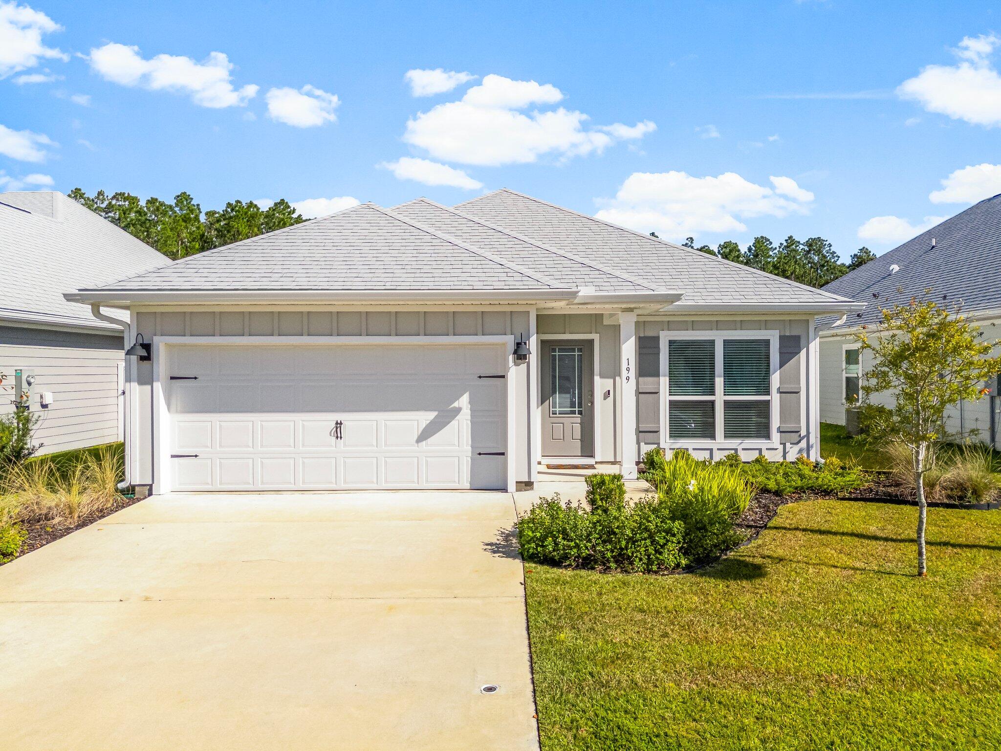 OPEN HOUSE! SATURDAY 12/14 11AM-2PM! SUNDAY 12/15 2PM-4PM!Welcome to 199 Butler Cv in the sought-after Bayside at Ward Creek community, Panama City Beach, FL. This stunning 3-bedroom, 2-bathroom, 1,736 sq ft home boasts a versatile flex space, vaulted ceilings, and an open-concept design perfect for modern living. The kitchen features elegant white cabinetry, granite countertops, and a center island ideal for casual dining. Relax in the master suite with tray ceilings, plush carpeting, and a spa-like en-suite bath with a soaking tub and walk-in shower. Step out to the screened patio and enjoy serene pond views and no backdoor neighbors. Fence added by previous owners. Community amenities include a pool and nature trails.