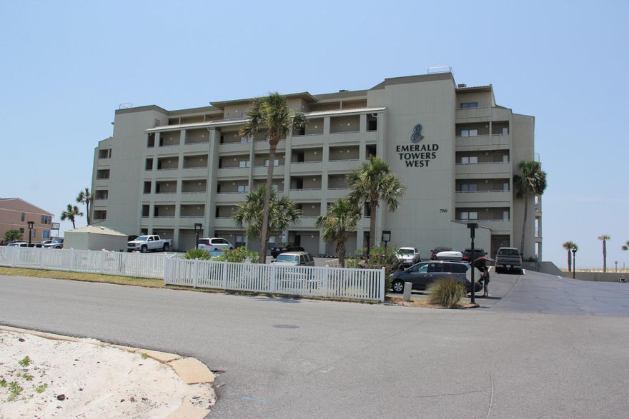 Direct Gulf Front condo with Beautiful views from the living room, master bedroom and kitchen. Emerald Towers West is a quaint 6 story midrise with only 44 units. Amenities include community pool with bathrooms and barbecue area. The unit includes washer and dryer and large walk-in utility/owner closet. Selling Agent is a licensed real estate agent in the state of florida and has ownership in this property. Please note HOA has taken on task of doing a wonderful renovation on the building. The work is complete but as a result there are two special assessments being paid.