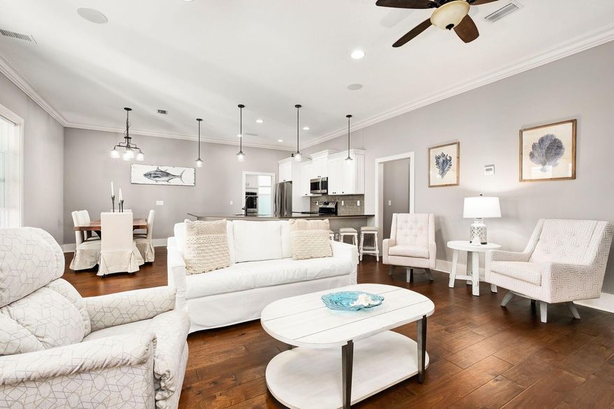 Numerous upgrades and a prime beach location near public access on Scenic 98 make this five-bedroom home in gated Frangista subdivision an excellent primary home, vacation retreat or rental investment. Never rented and newly built in 2015, this home features two owner's suites with one on the main level with double walk-in closets and another on the second floor with a covered balcony. There is a one-car garage and easy access to the community pool. This floor plan includes a fifth bedroom which allows for projected gross rental income of $130,000 with two built-in bunk beds tucked away behind custom barn doors.  Rhino Shield exterior coating and ninja epoxy flooring on the lower porches has been added along with all new furnishings, which are negotiable in the sale.