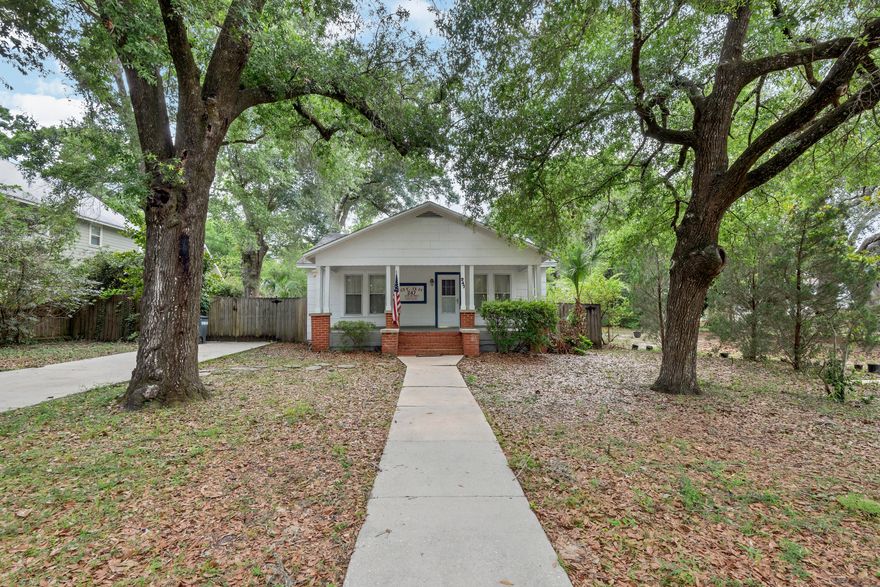 This is your opportunity to own a true Florida Cottage! This two-bedroom, one bath is boasting with charm and centrally located in Valparaiso. The dining and living space are separated by French doors to add to the character of this home. Tons of windows leave natural light throughout each room. This property features a spacious front porch, perfect for enjoying your morning coffee! The large backyard has tons of potential, with closed in sunroom/porch off the kitchen!  Steps away from the Emerald Coast waters. The large kitchen features stainless steel appliances and window over the kitchen sink. Rare opportunity to own close to the water!
