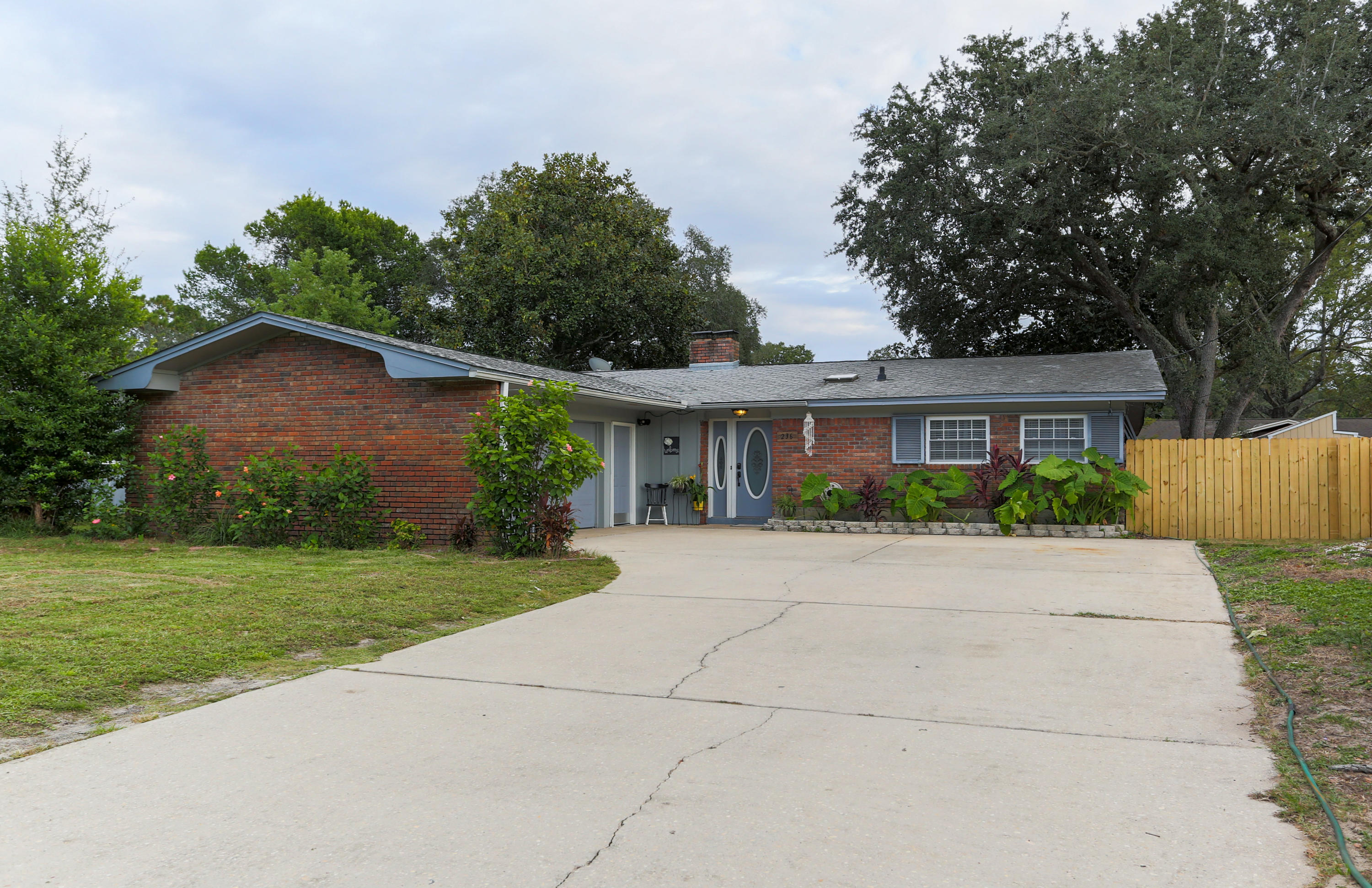 Come check out this newly renovated and well maintained brick home. It features 3 bedrooms and 2 bathrooms, 2 living room spaces each with it's own fireplace, a formal dining room and a large Florida Room thats heated and cooled. The home has been recently updated: All NEW Stainless Steel Appliances, NEW Luxury Vinyl Flooring, NEW Carpets, Fresh Paint Throughout, both bathrooms have been completely renovated, the kitchen features have been updated, NEW Light/fan fixtures throughout the home, NEW Sod in Backyard. Central to everything: Beaches, Bases, stores and more! Seller is including a 1-year Home Warranty!