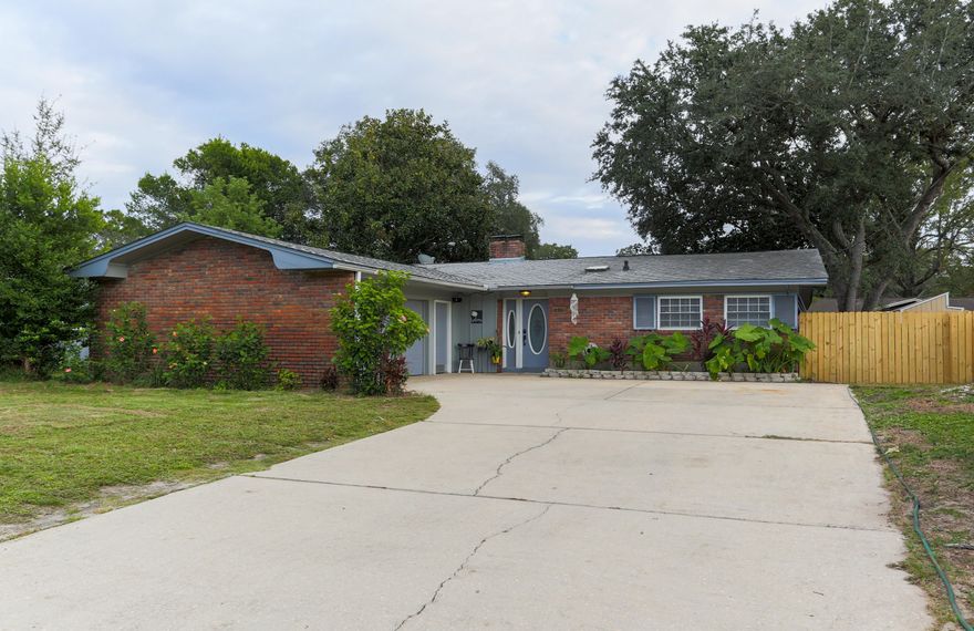 Come check out this newly renovated and well maintained brick home.  It features 3 bedrooms and 2 bathrooms, 2 living room spaces each with it's own fireplace, a formal dining room and a large Florida Room thats heated and cooled.  The home has been recently updated:  All NEW Stainless Steel Appliances, NEW Luxury Vinyl Flooring, NEW Carpets, Fresh Paint Throughout, both bathrooms have been completely renovated, the kitchen features have been updated, NEW Light/fan fixtures throughout the home, NEW Sod in Backyard.  Central to everything: Beaches, Bases, stores and more!   Seller is including a 1-year Home Warranty!