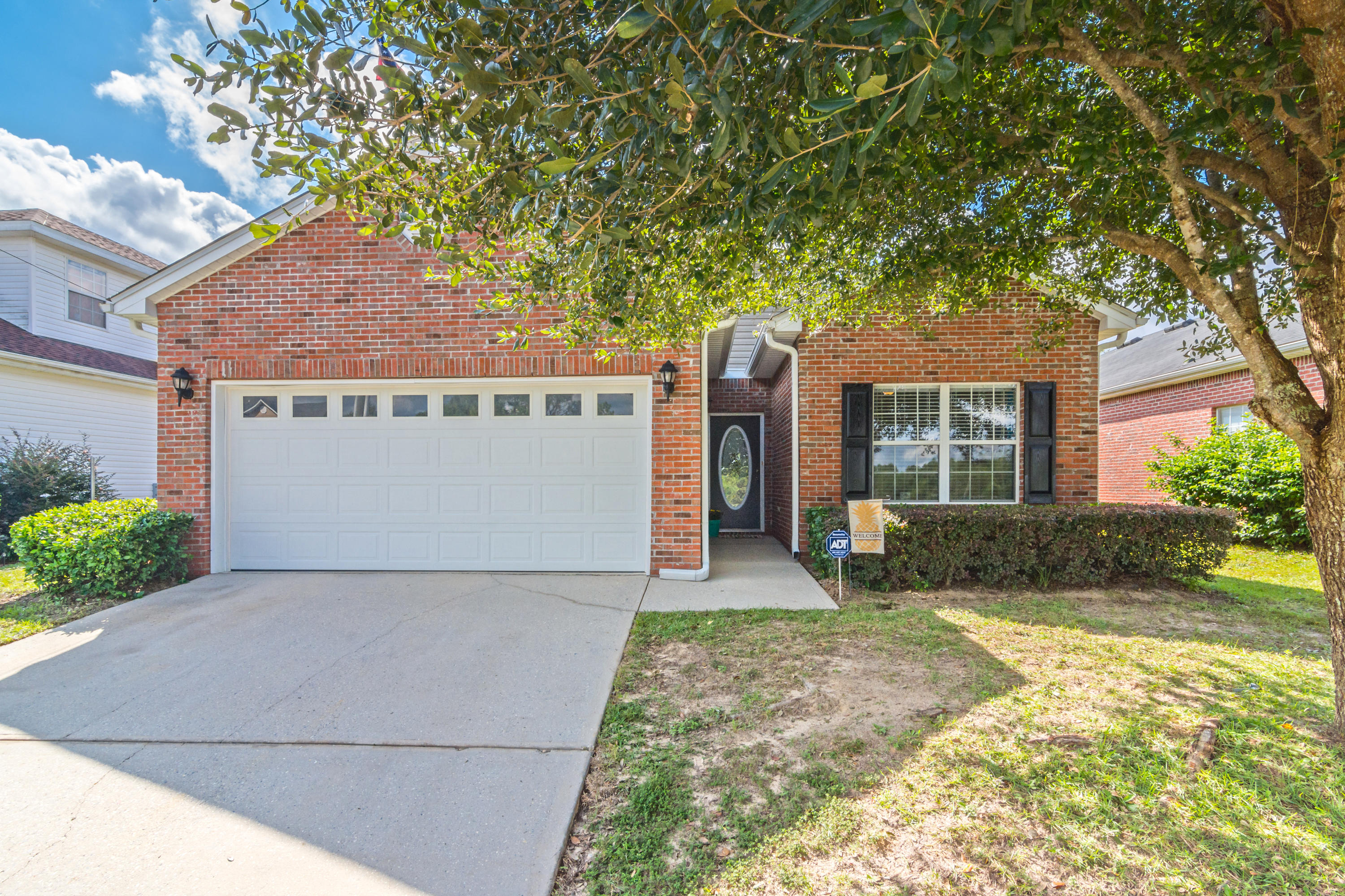 Brick home level fenced back yard! Beautiful condition laminate wood flooring , tile and carpet in the bedrooms! Vaulted ceiling in the living room, tray in the master bedroom! The huge master bath makes a great place to unwind the day! The beautiful granite counter tops and lots of cabinet /storage space says home sweet home! There is an office nook for doing homework and a spacious yard for entertaining ! Its just a short commute to area beaches and Military bases! Bring the Family Home to S. Lakeview Drive today!
