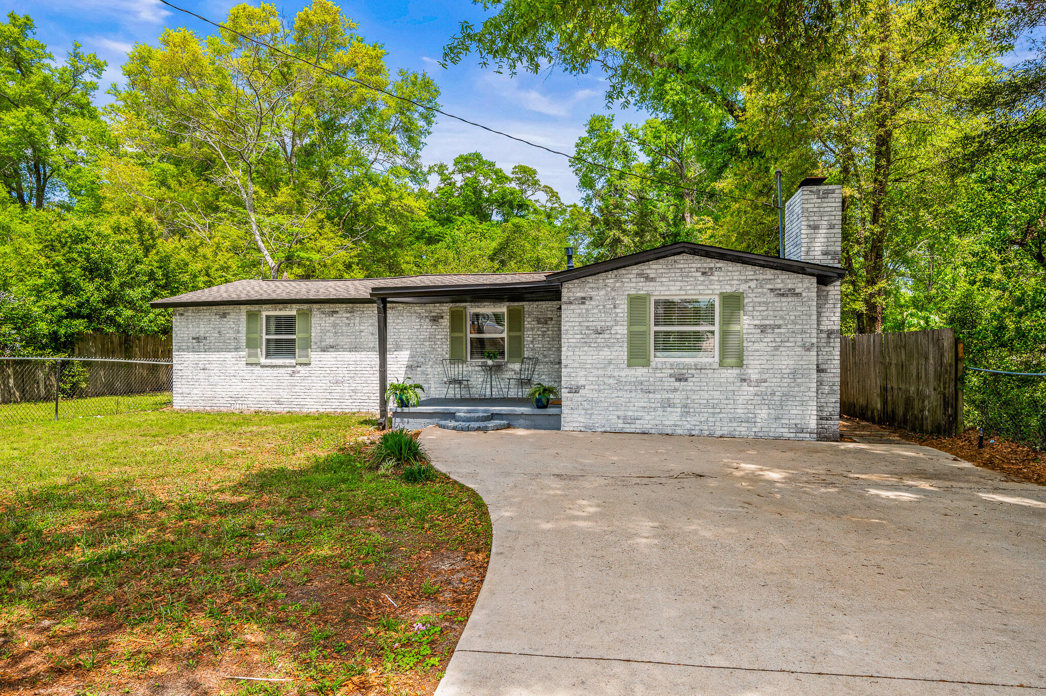 Welcome to this charming 3 bedroom, 2 bathroom home located in the heart of Crestview, FL. This newly renovated house features fresh paint, a new roof, luxury vinyl plank flooring, new stainless steel appliances, and shiplap accents in the kitchen. Did we mention the massively oversized bedrooms? Plus, enjoy the convenience of washer/dryer hook-ups and central A/C to keep you comfortable year-round. The laundry room provides extra storage space, while the fenced-in back yard offers privacy and security. Large out building for additional storage. With brick siding adding to the curb appeal, this house is the perfect place to call home. Contact us today to schedule a tour and make this house your own!
