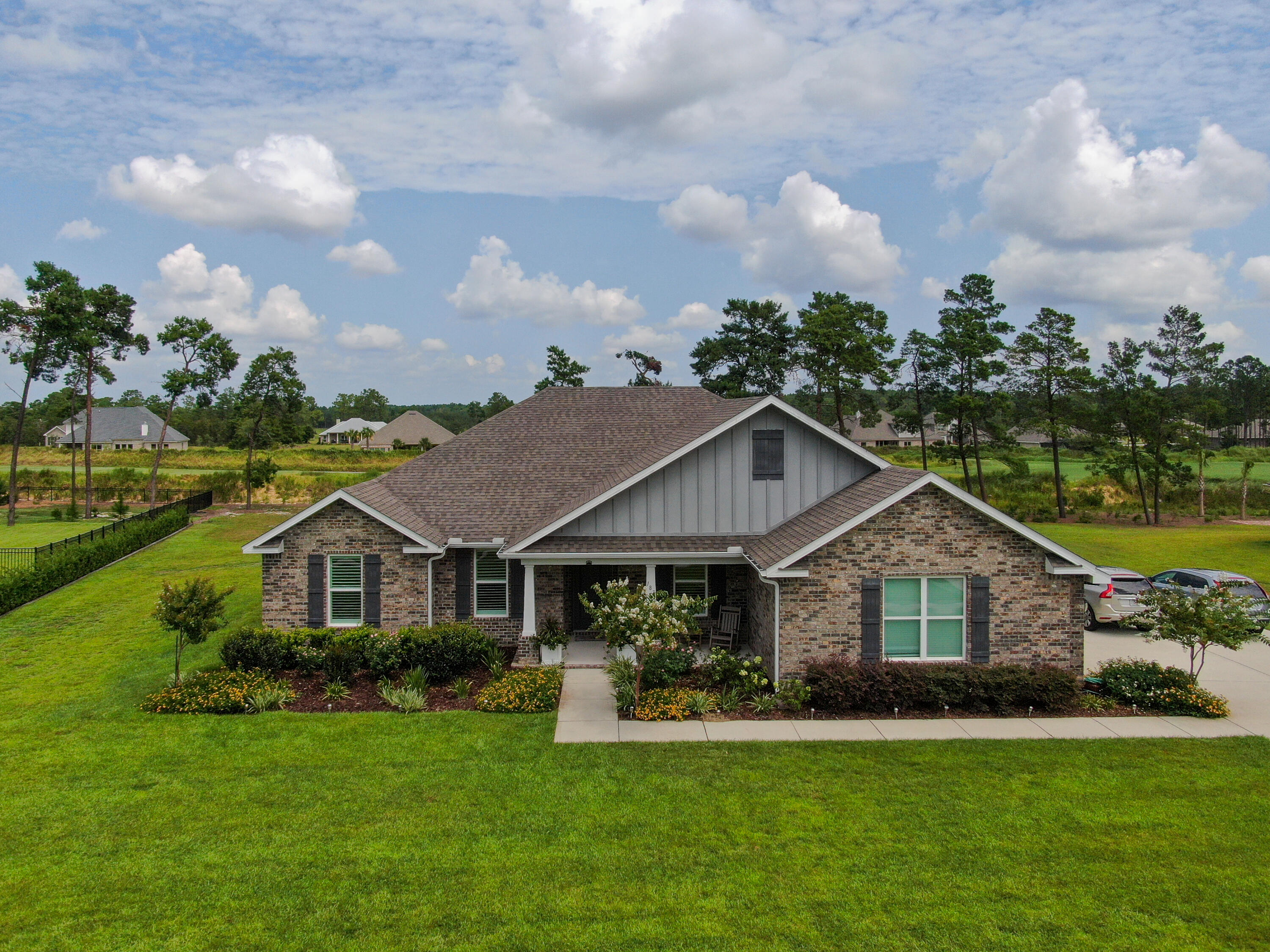 *Seller offering up to $7,500 towards buyers' closing costs.* Your search ends here. This 4-bedroom, 3-bathroom residence, constructed in 2020, boasts meticulous attention to detail. Numerous enhancements grace this home, such as plantation shutters in the office, formal dining room, breakfast area, and great room. The house features not one, but two pantries, along with crown molding, quartz kitchen countertops, and upgraded granite countertops in the bathrooms. Shiplap decorates the great room, while the rest of the home is adorned with LVP flooring, except for the guest bedrooms. The master bedroom includes an owner's retreat, and the kitchen comes with an upgraded gourmet package. Step onto the screened back porch to take in the view of the fenced backyard, complemented by beautiful landscaping surrounding the extended back patio and firepit.
Step onto the screened back porch to take in the view of the fenced backyard, complemented by beautiful landscaping surrounding the extended back patio and firepit.
Nestled along the 7th fairway, this residence is situated within the secure gates of Windswept Estates, a gated community.
Residents relish an assortment of amenities, including a community pool, clubhouse, pavilion with a BBQ grill, tennis and pickleball courts, basketball facilities, a playground, and even the convenience of weekly food trucks. The community also hosts special holiday events and offers scenic walking trails, creating a lively and engaging atmosphere. Don't miss the chance to experience all these remarkable features in person - schedule your showing today.