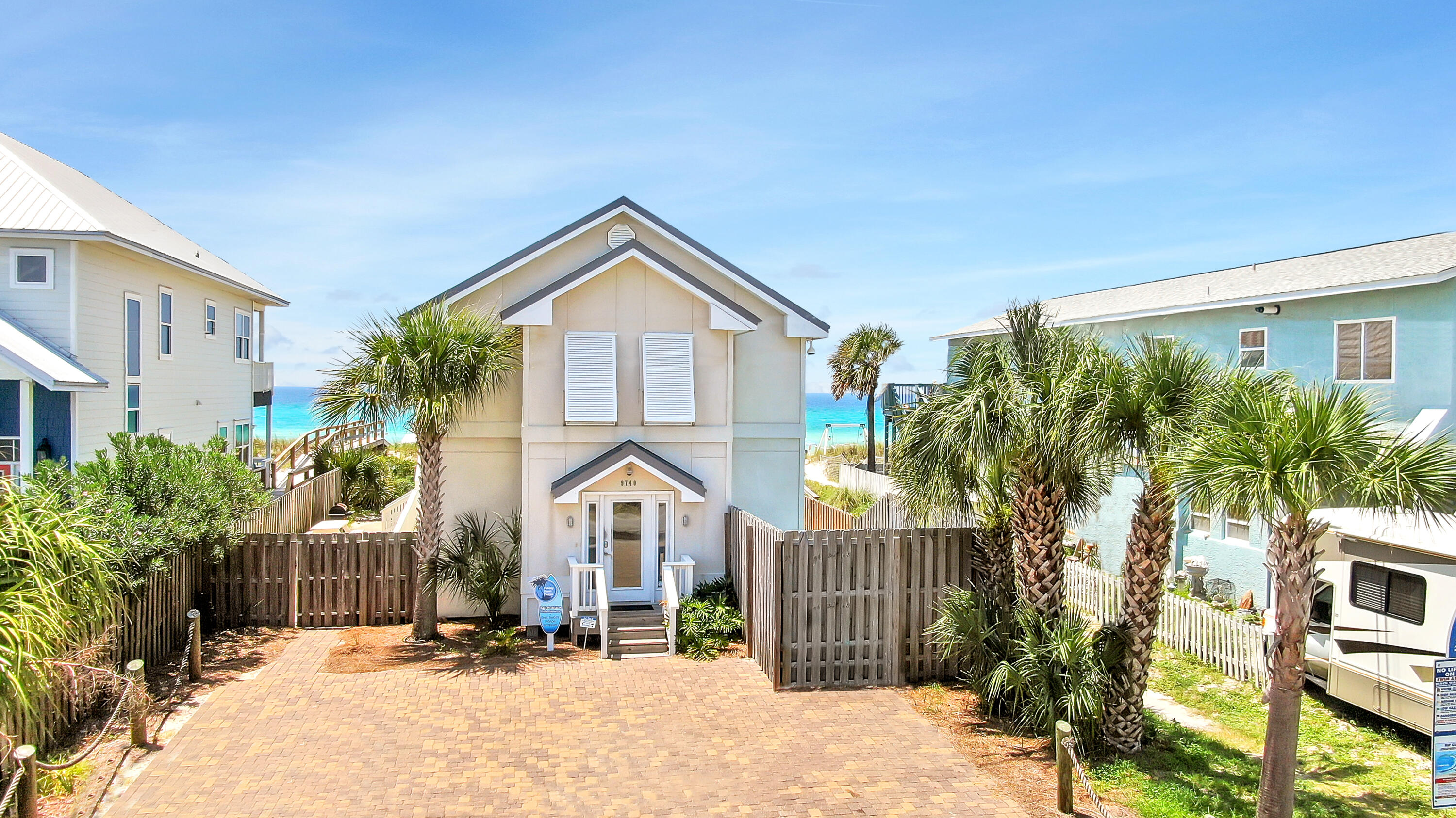 Price REDUCED! Investors and Beach lovers this Gulf front home features 6 bedrooms, 6 baths, private fenced pool, 2-covered porches, and has direct beach access with a private boardwalk. Each floor has its private covered balcony offering stunning views of the beach, making it the perfect place to sit and watch the tide roll in. The first floor features your main living area, spacious kitchen, dining area, laundry room, and two oversize bedrooms. The second floor features a small sitting area and 4 bedrooms. They are 2 Gulf-facing Master bedrooms that each have an en-suite bathroom both rooms open up to an ocean-view balcony. This sought-after beach area is within walking distance to the famous Pineapple Willy's This comes furnished and sleeps 16 guests.