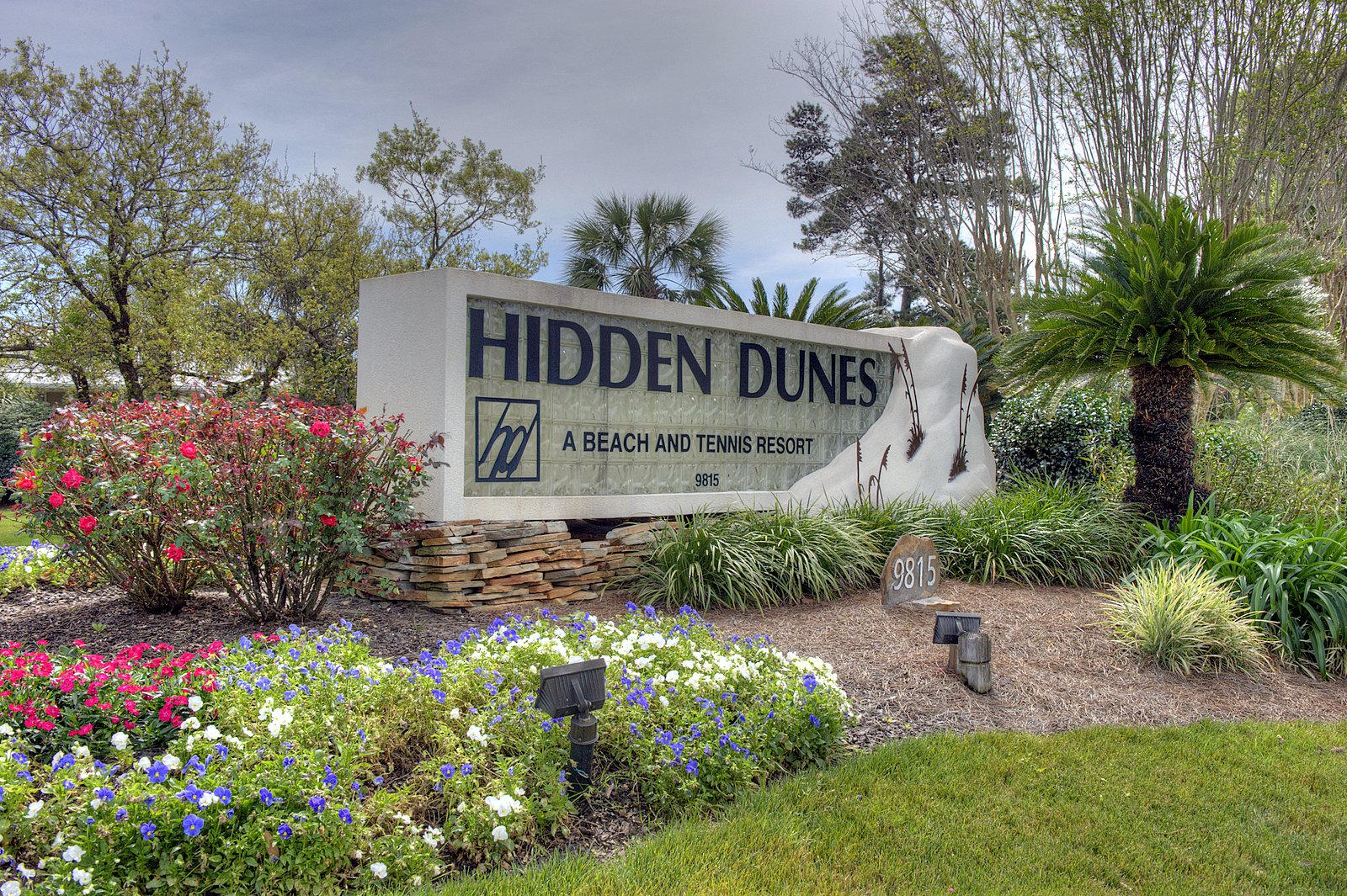 This condo has the WOW factor the moment you walk in the door...! Freshly painted and completely renovated, this unit is open and airy, with new kitchen and bathroom cabinets. Rental ready and priced to sell. Hidden Dunes is a one of a kind resort with 27 acres, pools, award winning tennis and deeded beach access.