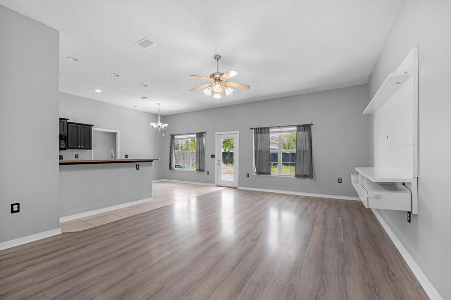 **MULTIPLE OFFERS. HIGHEST AND BEST DUE BY 12PM 4/14** VA Assumable loan available at 3.25%! *NEW ROOF with acceptable offer* Welcome home! This freshly updated 4-bedroom, 2-bathroom home features a split floor plan and brand new vinyl flooring in the main living areas. Most of the interior has been recently painted, including the kitchen cabinets, giving the space a clean, modern feel. Tile floors cover all wet areas for low-maintenance living. The layout offers privacy with the master suite on one side and two additional bedrooms on the other and the fourth bedroom towards the front of the house (perfect for guests, a playroom or a home office). The master bedroom includes a walk-in closet and a private bath. The open living and dining areas create an easy flow for everyday living or... hosting guests. Step outside to a large fenced yardperfect for pets and entertaining. Located just minutes from Eglin AFB, Hurlburt Field, and the beautiful white-sand beaches of Florida's Emerald Coast. Schedule your showing today. **Water heater 2025 & HVAC & Duct System 2022**