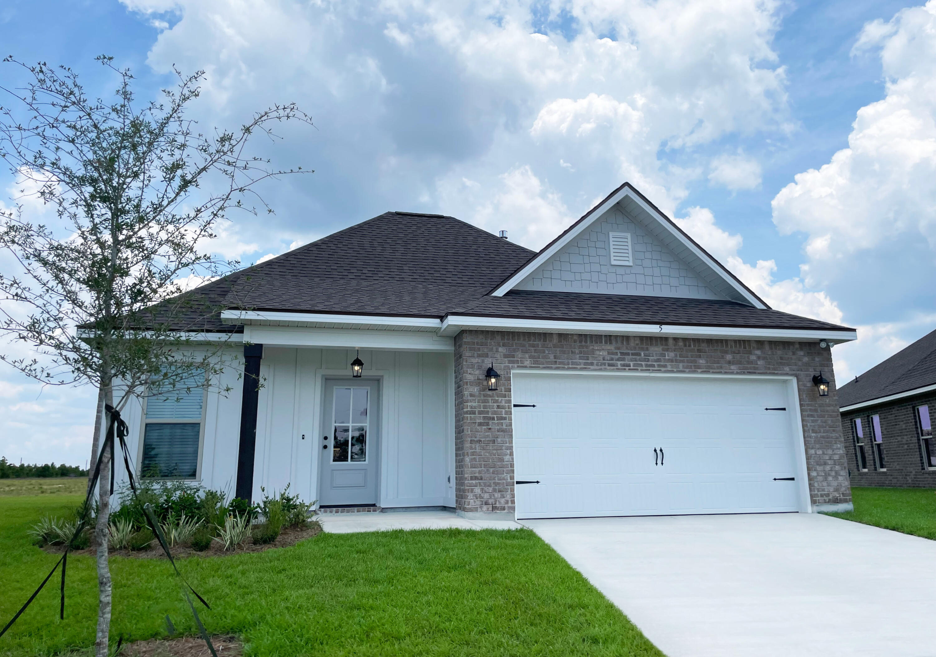 Awesome builder rate + choose TWO free: front gutters, refrigerator, smart home package, or window blinds. Restrictions apply.Located on a cul-de-sac lot, the THOMAS III G in The Bluffs at Lafayette community offers a 4 bedroom, 2 full and 1 half bathroom open design. Upgrades added (list attached).Special Features: double vanity, garden tub, separate shower, and walk-in closet in master suite, master closet opens into laundry room for added convenience, kitchen island, walk-in pantry, covered rear patio, recessed lights, crown molding, undermount sinks, framed mirrors, landscaping, architectural 30-year shingles, flood lights, and more!Energy Efficient Features: tankless gas water heater, kitchen appliance package with gas range, vinyl low E windows, and more!