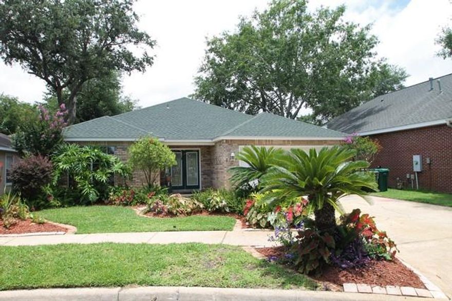 Great central location for this beautiful 3 bedroom 2 bath home in popular Whitrock Village. Home is all brick with an architectural shingle roof and is located on a cul-de-sac with very little traffic. Very open floor plan. Roof and HVAC replaced in last five years. Kitchen was completely remodeled with new cabinets, appliances, and counter tops. Interior freshly repainted. All wood laminate flooring except for one bedroom. and bathrooms are tile. Master bath has a garden tub and a separate shower. Huge master bedroom closet and bedroom has trayed ceiling. All brick construction. Lovely corner gas log fireplace. Attractive tropical landscaping with very little grass to maintain. In ground sprinkler system to keep it all lush and green., Termite bond. Double car garage.