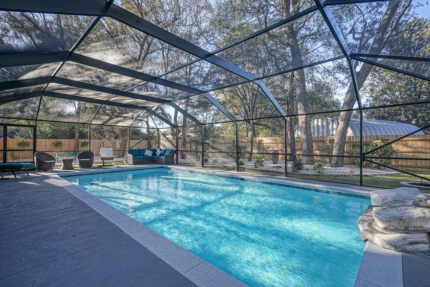 Dreams do come true! New oversized gunite pool with a waterfall and screen enclosure, sprawling yard, professionally landscaped with many areas to lounge, unwind and play sports. A newly remodeled, custom brick home with fireplace designed for entertaining. Open floor plan offering enough space for another bedroom. No expense spared on high ceilings, recessed lighting, the updated kitchen appliances plus plantation shutters and upgraded doors and windows. Luxurious master bathroom offers a freestanding tub and easy access shower of the latest tile. Over $100,000 spent on remodelization. Wind mitigation, WDO and home inspections completed; saving you hundreds. All repairs deemed necessary will be done. Home warranty to include pool coverage offered for peace of mind. Closing cost assistance