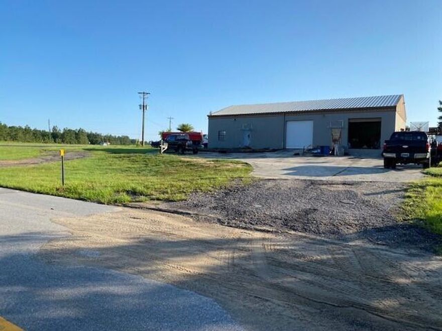 Zoned HEAVY INDUSTRIAL!! Huge income potential.  Great location. Minutes from I-10. Minutes from the beach. The largest property around with this zoning. Two driveways. 2 offices, 2 stories, 2 bathrooms, 2 bay doors, 1 loading dock. Half the property is still wooded. The turn lane for 331 and Edgewood is in front of the property for easy access.