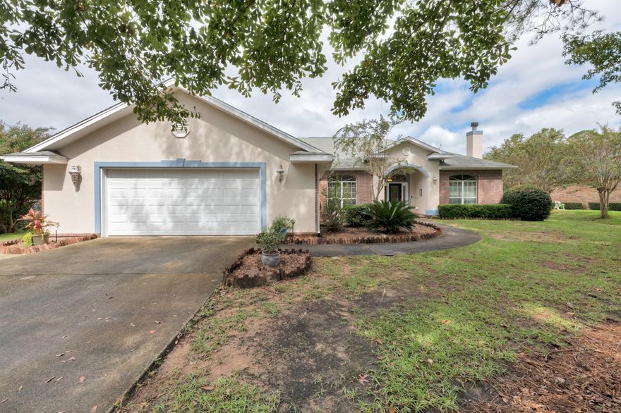Don't miss your opportunity to enjoy life on the 16th fairway of the upcoming Blackwater Golf Course.  This home features an open w/ split bedroom floor plan, beautiful views of the golf course w/ an abundance of natural light, 10' ceilings all w/ crown molding.  It boasts wood floors throughout, except for 2 bedrooms which have carpet & tile in the wet areas, ceiling fans in all the rooms including the master bath.  The formal living room has built-in shelving on both sides of the wood burning fireplace.  The formal dining room contains trey ceilings & columns that help define the space while keeping it open.  Off the dining room is a granite wet bar perfect for entertaining.  The kitchen has granite countertops, tiled backsplash, coffee bar, a separate filtered waterspout at the sink, & an eat-in area.  The kitchen pantry is large & contains custom shelving.  The spacious laundry room is between the kitchen & the garage & can be used as a mudroom.  It has an extra pantry that can be doubled as storage space.  Off the eat-in kitchen area, you can access the grilling deck. Take in beautiful view of the fairway from your screened in tiled porch which can be accessed from 3 separate areas. You're also able to enjoy the same views from the living room via the triple sliding glass doors.  The master bedroom is just off the living room w/ access to the screened in porch.  The master bath has a dual sink, cultured marble vanity, whirlpool garden tub, oversized stand up shower with a short lip to step into, walk-in closet.  The master bath has button that initiates the water pump to pull hot water from the hot water heater to warm up the master shower faster. The guest bath also has a dual sink vanity, linen closet, & an exterior door that leads to the side yard. The oversized 2-car garage also has a side entry golf cart garage door so you can pull your golf cart right in.  The driveway is oversized & will hold 6 cars.  It is paved to the side golf cart entry to the garage. There is a $40/year voluntary HOA that maintains the street lamps.  Other features: Exterior paint 2020, Honeywell wifi-enabled thermostat, Schlage keyless entry w/ wifi-enabled keypad, Ring Doorbell