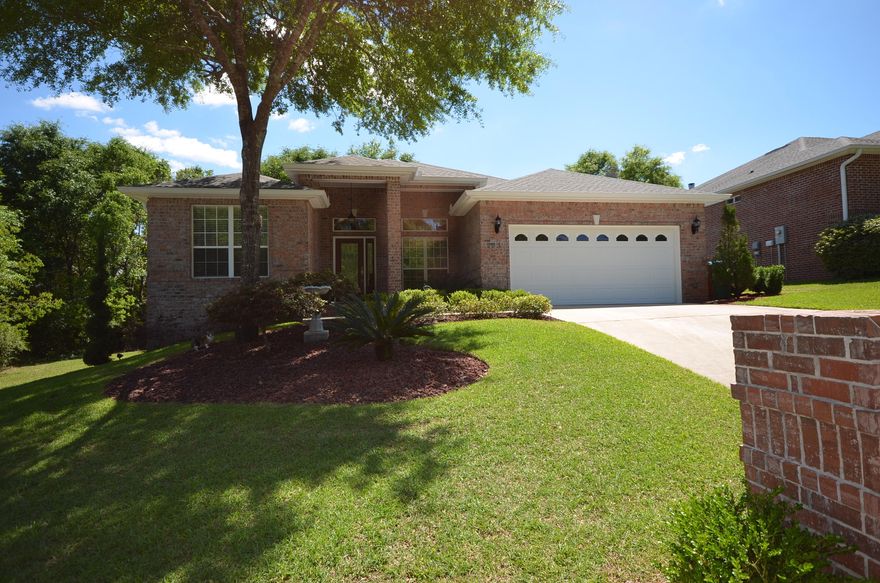 Immaculate- pride of ownership shows! This 4bd/2ba home also includes a formal dining area and wet bar. This home is perfect for entertaining or enjoying time with your family with large open kitchen, all stainless appliances, kitchen island, bar, all granite counter tops and open to the living area. All rooms are large with spacious closets. Tile and laminate flooring in all common areas and master bedroom. Master bath features a large whirlpool tub, walk in shower and his and her closets. Garage is a car enthusiasts show room. Covered porch on front and back of home. Gorgeous landscape and flat backyard. Current owners will leave security cameras that are easily monitored electronically and through your TV screen.