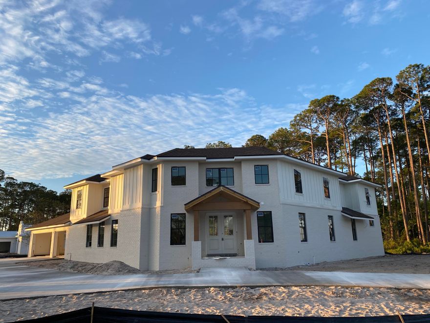 NEW CONSTRUCTION OPPORTUNITY IN DRIFTWOOD ESTATES! Sunset & Sunrise Bay views all across 2nd floor. This stunning home will be complete May 2020. Schedule a showing during Sunrise or Sunset and you will not be disappointed!This modern farmhouse sits on a 0.766 acres, NO HOA! This new home features a large open living room that connects the kitchen, master and outdoor spaces. The Master Bed located on 1st floor, has a spacious walk in closet, walk in shower with his & her rain heads, a soaker tub and double vanities. Double French doors lead out onto a large back patio and private back yard. 3 bedrooms, 2.5 baths are on the second floor with a second living room (playroom or office) over looking the main floor. This 2nd Living Room has the best water sunrise and sunset views.