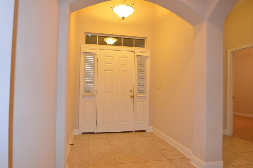 **GETTING A BRAND NEW ROOF-JANUARY 2022!!***  YOU WILL WANT TO SEE THIS BEAUTY!! This lovely home offers a vast amount of space with cathedral ceilings and arched entryways throughout home. Open floor plan for living, breakfast and kitchen areas which is great for entertaining. Living room offers a gas fireplace. Kitchen has center island with breakfast bar, smooth/cooktop stove and plenty of cabinet and counter space. Ceramic tile throughout and carpet in bedrooms. Additional room for office area or baby nursery. When entertaining, you can also use your formal dining room. Back yard offers a nice wood deck with privacy fence to the back neighbors. Yard service included and is serviced by homeowners association. Lawn pump and sprinkler system allows for watering of your beautiful yard.