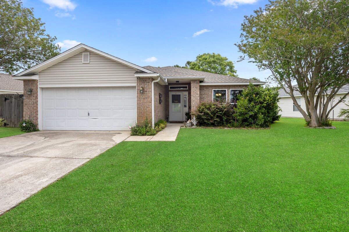 Beautiful Lake Front! Roof (2020), Water Heater (2025), Impact Windows/Doors (2022), Master Shower Remodeled/Tiled (2023), Florida Room /Office Flex area, a whole home and drinking water filtration system, and a spacious master walk-in closet, what more could you ask for? Well, all that to accompany a great lake view and mature blackberry bushes! Open and airy, this 3 bedroom, 2 bath home in Hidden Shores backs up to a picturesque lake with fountain. Foyer opens into open concept living/dining/ kitchen area. Tile in living areas and laminate flooring in the bedrooms - NO carpet! The kitchen boasts granite countertops, glass subway backsplash, and a new Frigidaire Refrigerator! Kitchen Aid microwave, stove and dishwasher that are all under 5 years old, topped off by a wraparound hop up breakfast bar. Large pantry and indoor laundry just off the kitchen. Master bath complete with solid surface double vanities with separate shower & jetted garden tub. Full guest bath with quartz countertop. Tropical landscaping with tranquil lake view off 32X12 patio. A MUST SEE! Call your favorite agent today!