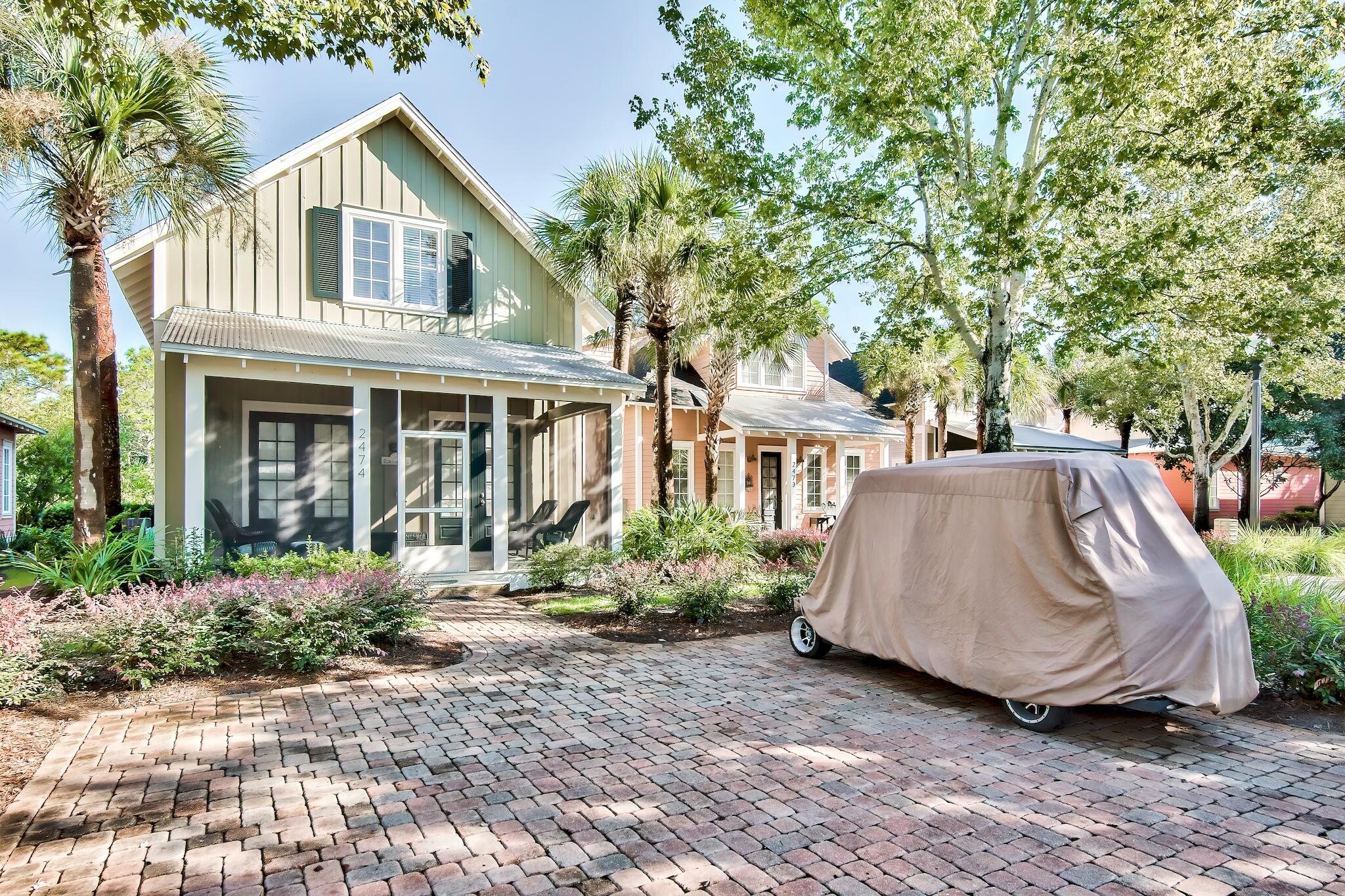 This FULLY FURNISHED Bungalow has NEVER BEEN RENTED and it show; is located just steps from the pool and conveys WITH A 6 SEATER GOLF CART, making it an ideal second home or vacation rental, as well as a breeze to explore all that the Sandestin Golf and Beach Resort has to offer. This meticulously maintained Bungalo boasts fresh paint inside and out, newer HVAC, and new Trex flooring on the screened porch. The 1st level features a beautiful FIREPLACE with two sets of French doors opening onto a large 10x20 screened porch, the Master Bedroom and bath, and a Powder room. The two additional ensuite bedrooms are located on the 2nd level along with extra attic/storage area. This Bungalo is a must see! HOA monthly total is $427.97 including the Bungalos HOA and the Sandestin Master Association.