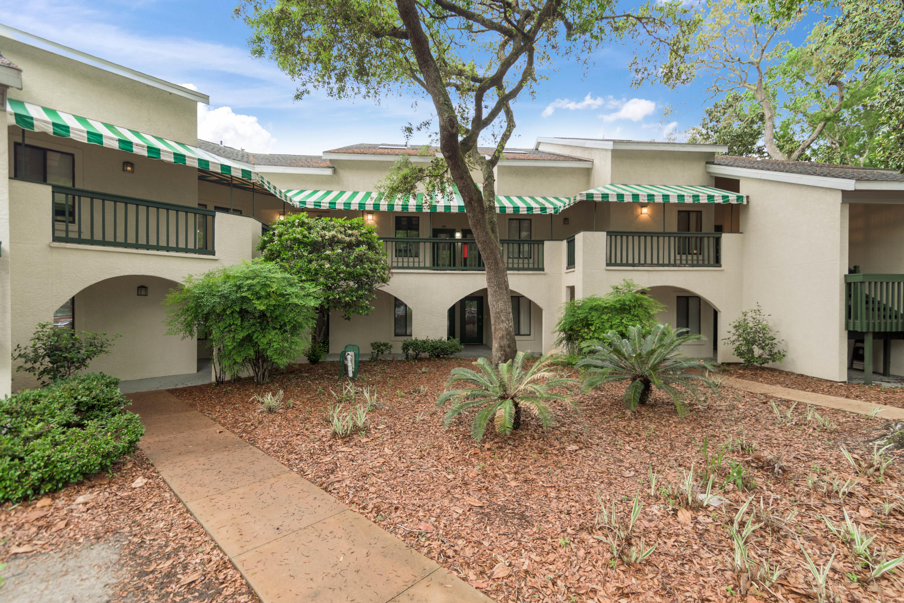 Due to COVID and to eliminate exposure, all 'first' showings can be done at the Open House on Sunday 5/02 1-3pm . Then private showings thereafter. All offers will be held until after the open house. *Virtual tour Available*This two-story condo is truly a gem! In the coveted area of Bluewater Bay in Niceville, this condo is not only in a perfect location, but is also completely renovated.All flooring throughout the condo is either tile (entry, hall and kitchen) or brand new wood laminate and the entire place has been freshly painted with newly replaced lighting fixtures.On the entry level you'll find a full bath, one bedroom, the kitchen and living space. The bathroom has a single vanity and tub / shower combo.