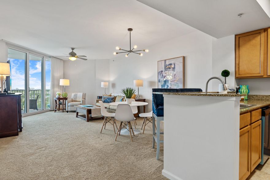 Watch Florida sunsets and Harbor fireworks from this turnkey, 10th floor unit! Gorgeous 2 bedroom 2 bath unit boasts a large balcony with access from the living room and master suite. With stunning views of Destin, Choctawhatchee Bay and the Gulf of Mexico.  Kitchen boasts maple cabinetry and granite countertops with NEW stainless appliances. The open floor plan is perfect for entertaining. Master bedroom has a king size bed ! Second bedroom is a full size bed!! Both bedrooms  feature new bedding! Checkout the upgraded lighting and new artwork! Enjoy the many onsite amenities, including a tropical oasis landscaped pool area boasting largest lagoon pool with waterfall features, a kiddie pool, hot tub, and splash pad, as well as a playground, fitness center, and tennis and basketball courts. The resort offers complimentary shuttle service to the beach for you to enjoy Destin's world famous sugar-white sand and emerald-colored water beaches. On site restaurant, coffee shop and ''Good Vibes'' pool bar are extra amenities for you and your guests to enjoy!

All utilities are included in the HOA dues water, sewer, electric, cable, Wi-Fi, phone and trash! This is an excellent opportunity for a vacation rental, secondary or primary home no long-term rentals are allowed. The Palms of Destin Resort and Conference Center offers the best in Destin vacation rentals and event space at an affordable price! Located on 15 beautiful acres, in the heart of Destin close to premier shops, nightlife, events, family and fine dining.

Pets allowed on property for owners only!