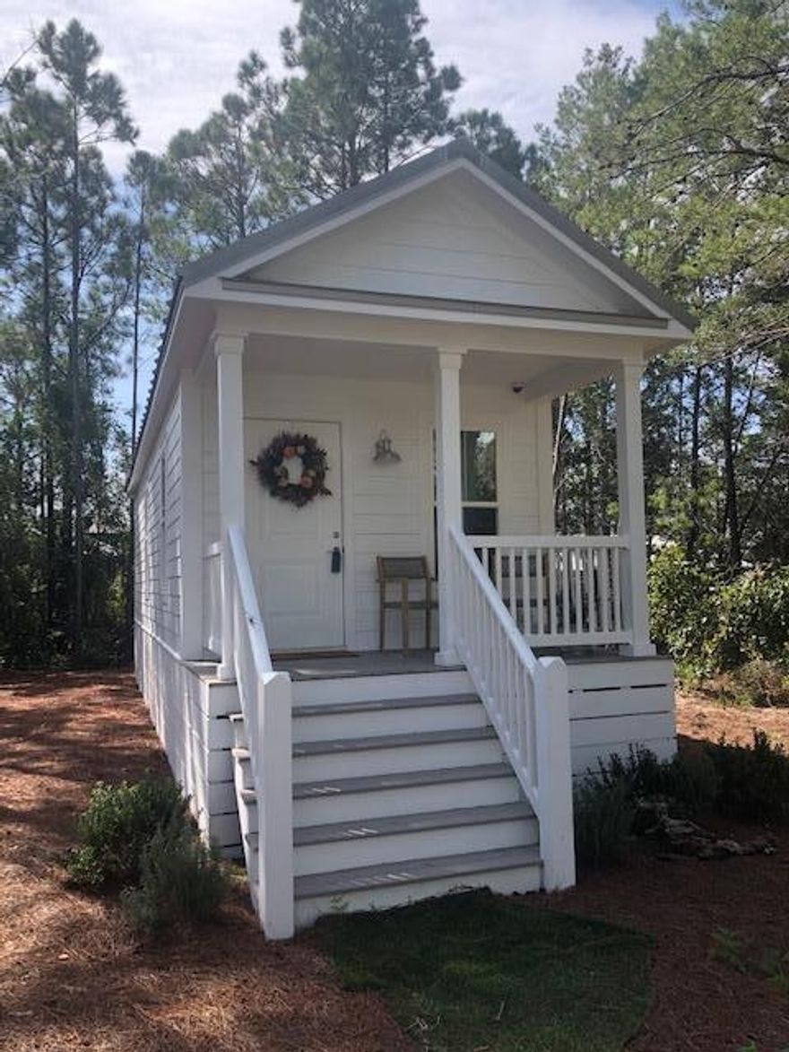 Grayton Beach Cottage on lot 38 ONLY ( Lot 39 listed separately mls 859273.) McKinnie's Unrecorded subdivision-  1/3 acre zoned Village Mixed-Use creating multiple possibilities. Located at end of private, dead-end road. Like new inside and out- exterior has standing seam metal roof, Hardie plank siding. Interior features laminate flooring, quartz counter-tops, new furnishings all kept comfortable by new ductless 'mini-splits' heat pump,  NO HOA! Walk to famous Black Bear Bakery, Wine Bar, Hurricane Oyster Bar and Grayton Corner Cafe, AJ's, Borago, Grayton Brew Pub and more!  County GIS maps indicate potential jurisdictional wetlands onsite-buyer to do own due diligence.