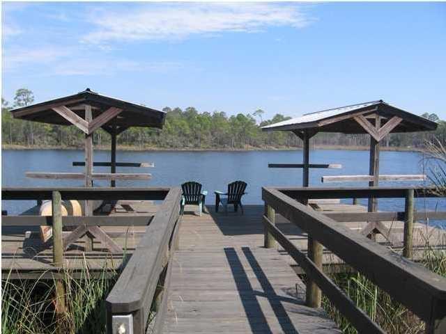 Priced to SELL! Are you looking for .30 acre Lake Front Lot in a gated neighborhood with HOA fees of only $260/qtr? If so, then check out this two lot combo that's in the heart of a booming area. Located conveniently just 1.5 miles from Alys Beach and 1/2 mile from the great food and entertainment of the HUB. With a more than an ample building envelope, build your dream home or secure a great investment opportunity with awesome views overlooking the protected State Forest and Camp Creek Lake. Own 57 feet of lakefront in flood zone X. This is an incredible opportunity to own a rare coastal dune lake lot along Scenic Highway 30A. Also offered together with adjacent lot to the West. (see MLS #735938) UNDER CONTRACT